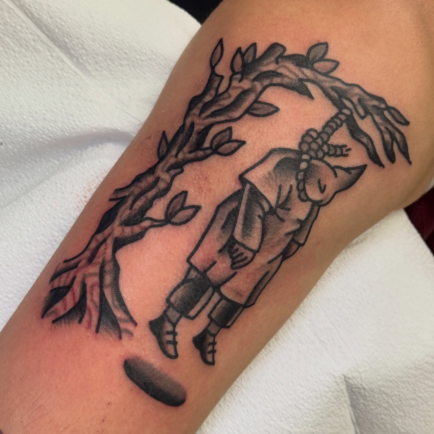 Child climbing tree black and grey tattoo on the forearm by Rafael Torres, San Francisco, California