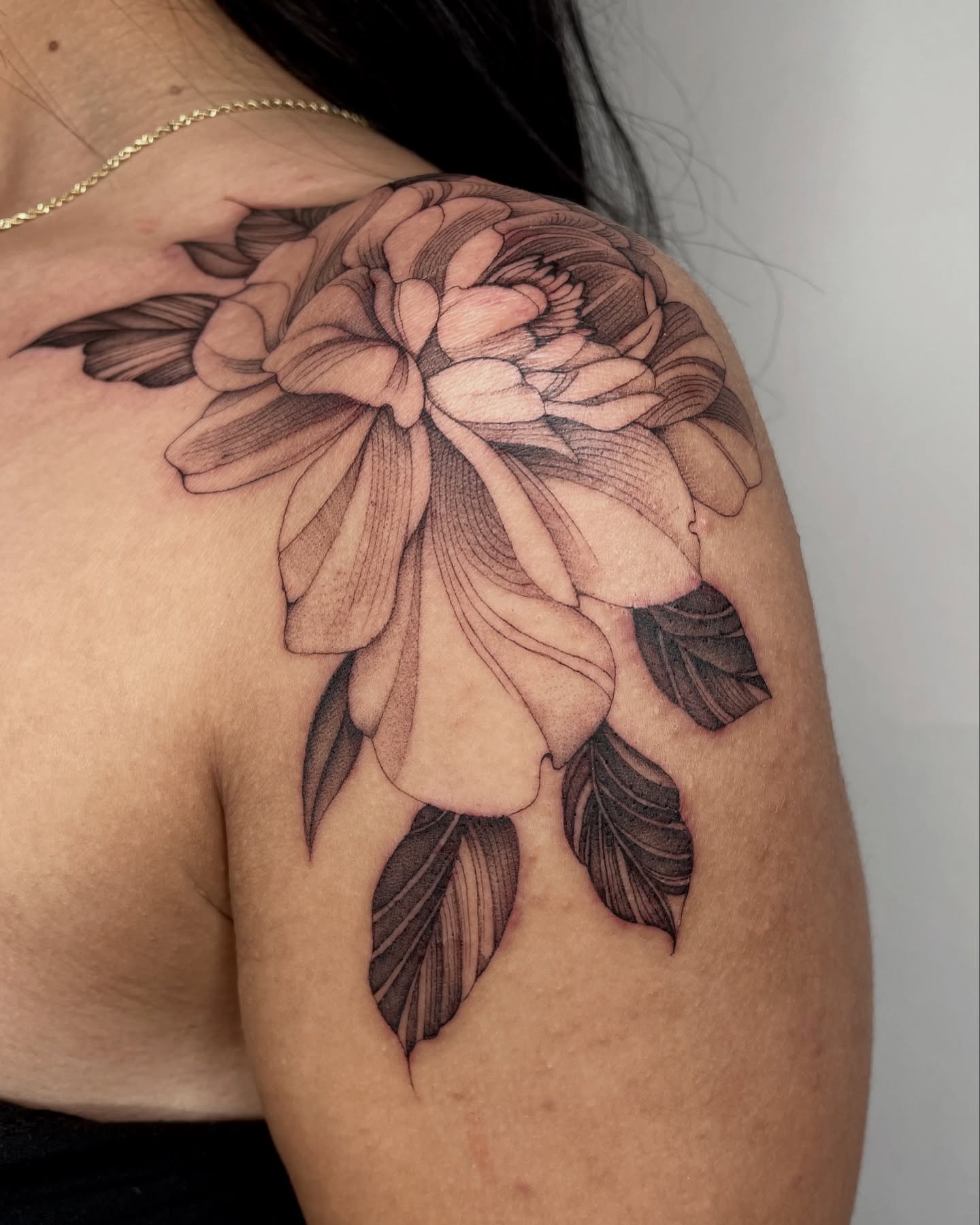 Peony black and grey tattoo on the shoulder by IVY