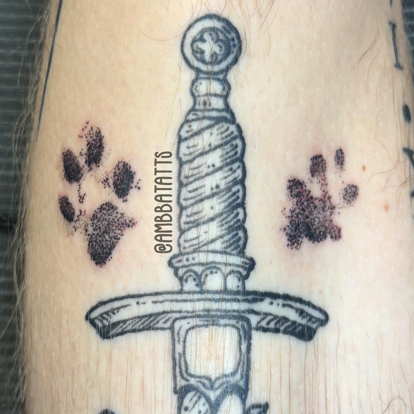 Sword black and grey tattoo on the forearm by amber brady, Brunswick, Ohio