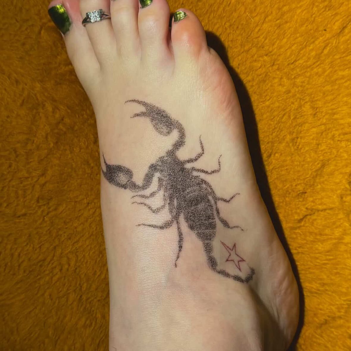 Scorpion black and grey tattoo on the foot by Jill