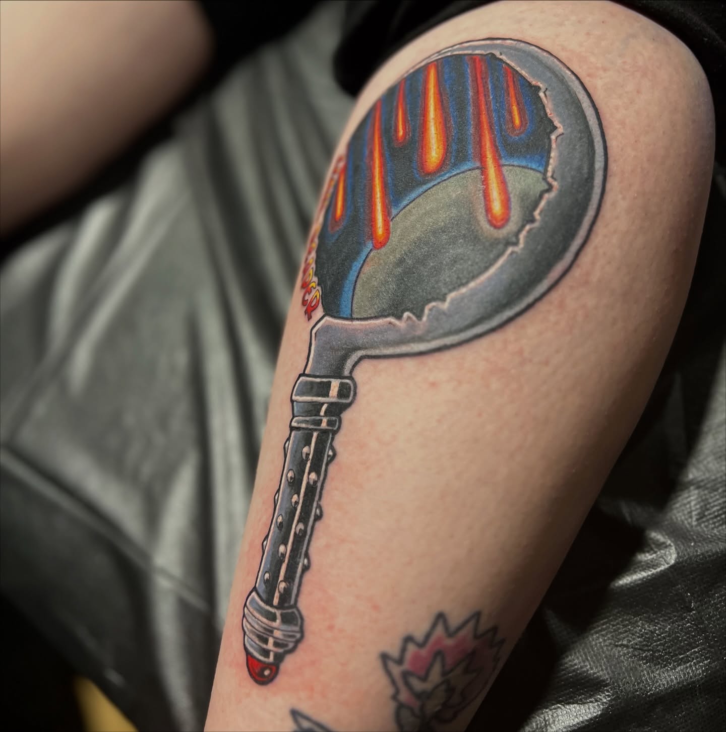 Magnifying glass dotwork tattoo on the forearm by Alex Santaloci