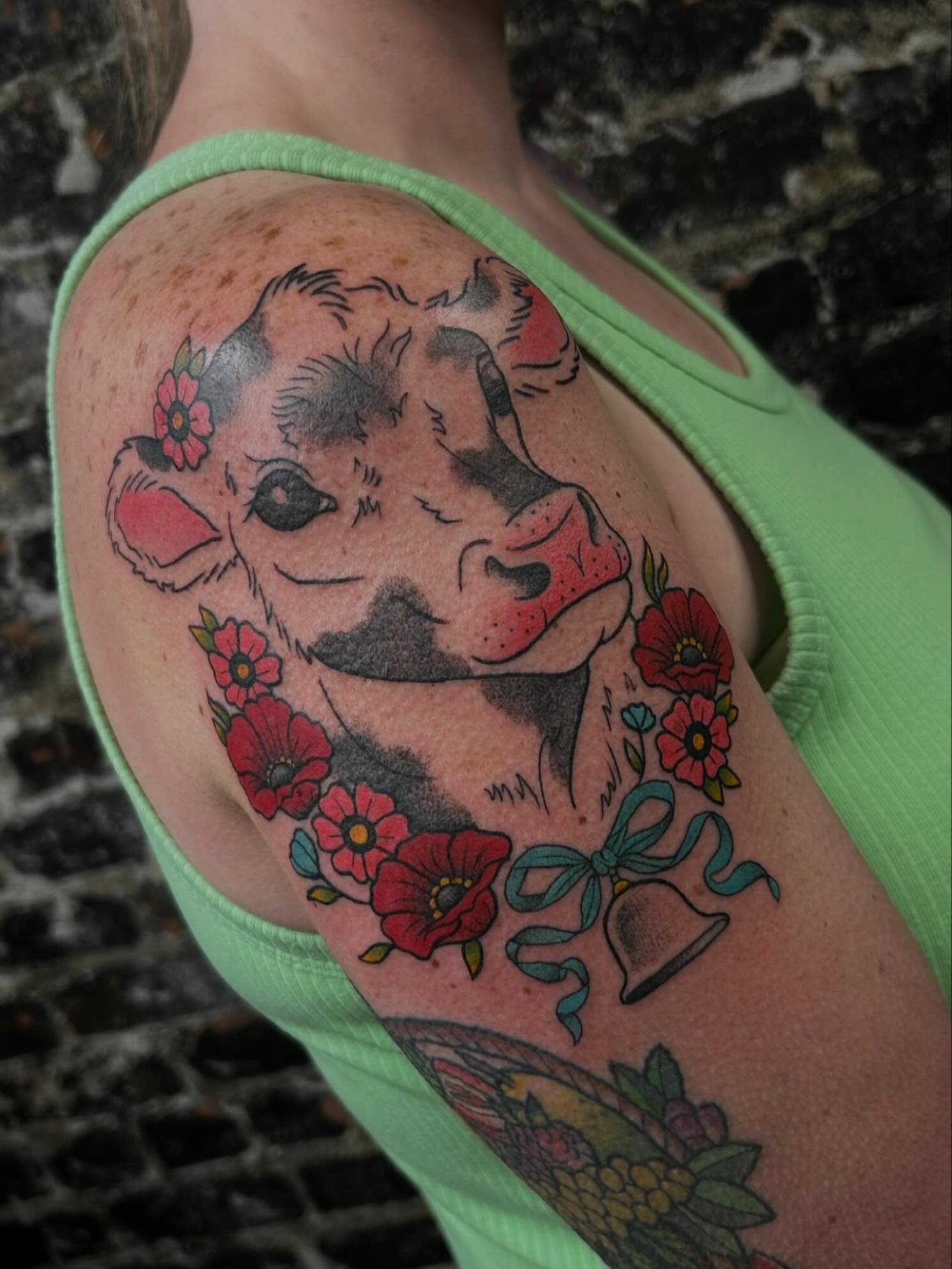 Cow and floral American traditional tattoo on the shoulder by 🇲🇽 Kiki