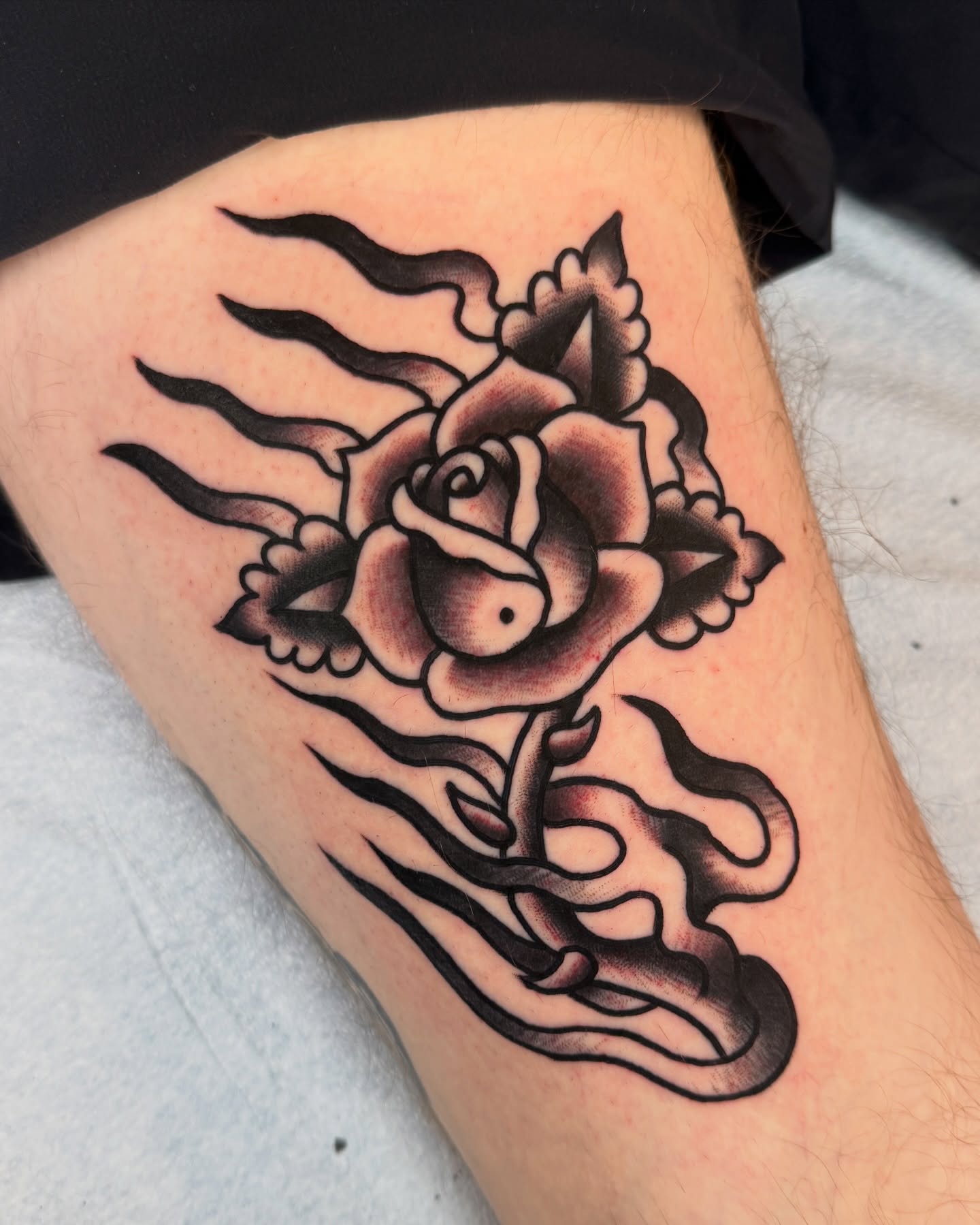 Rose black and grey tattoo on the thigh by Cullen Bleser Quinn