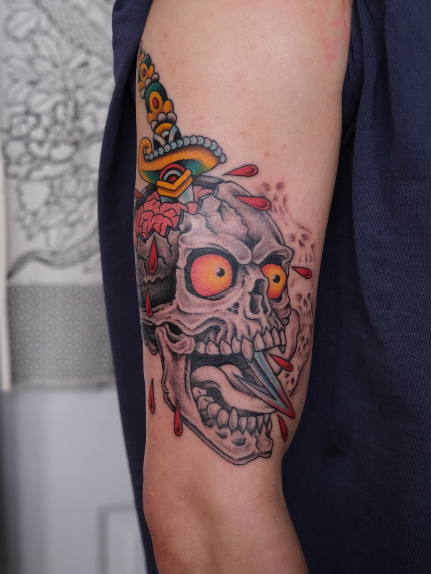 Skull with sombrero American traditional tattoo on the forearm by Zak Colburn
