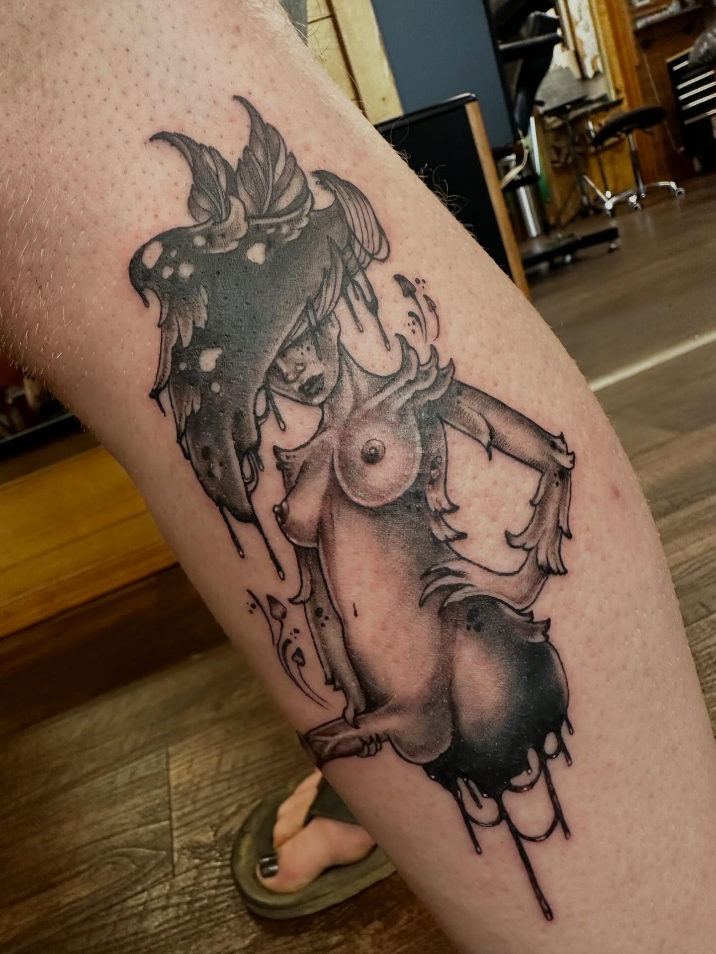 Bull and woman realism tattoo on the thigh by Michele Estes