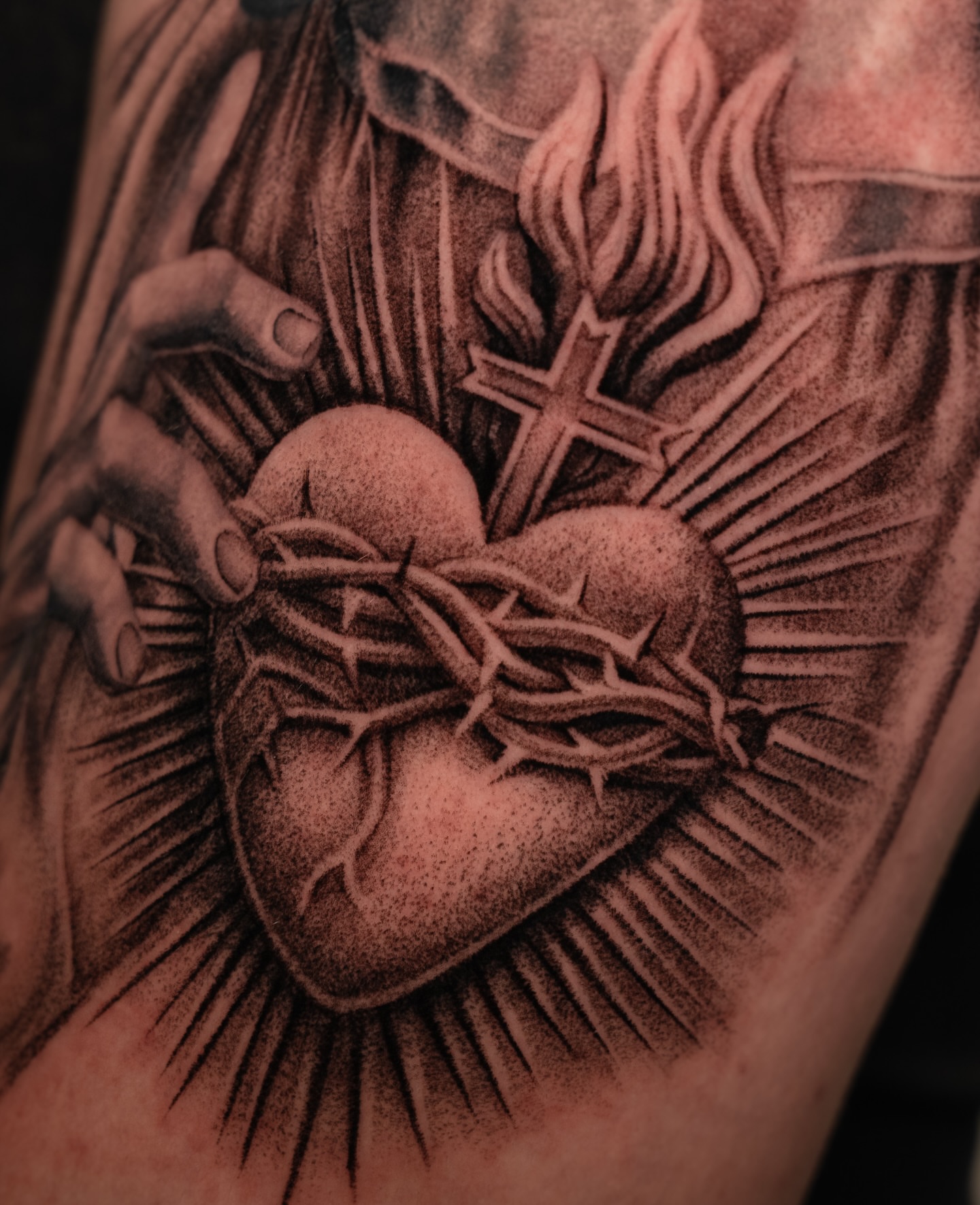 Heart with crown of thorns dotwork tattoo on the forearm by Lisa