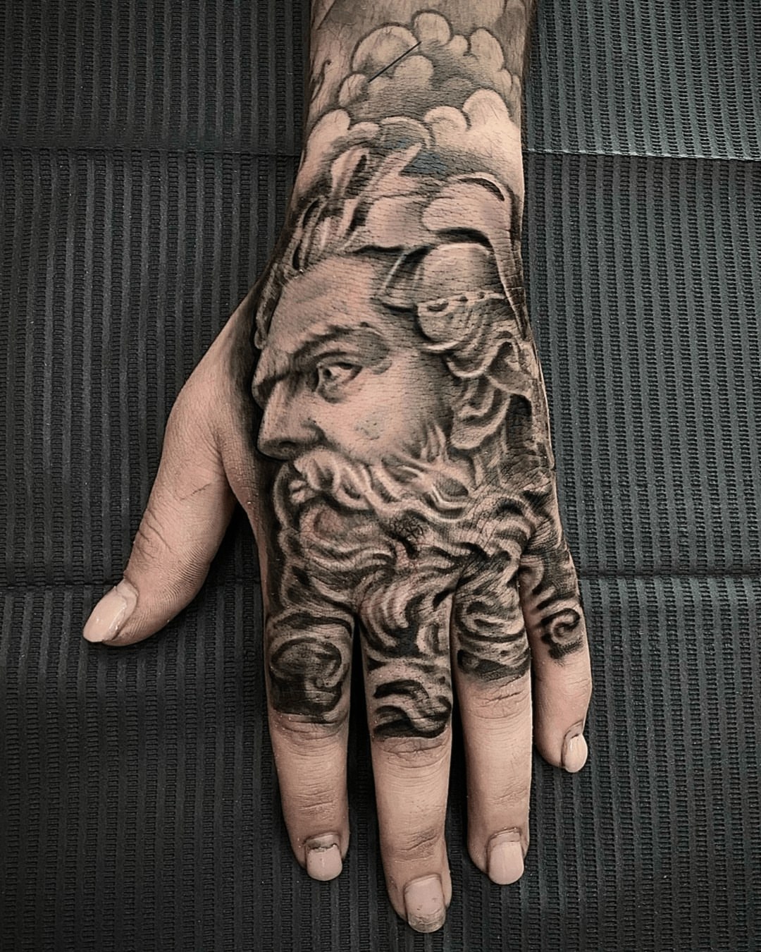 Bearded man realism tattoo on the hand by Gabriel Torres