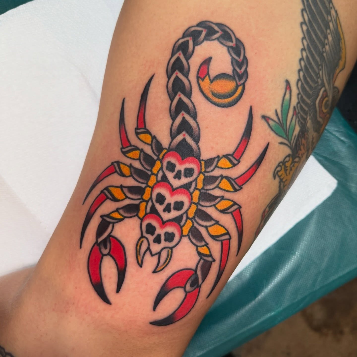 Scorpion American traditional tattoo on the forearm by Christopher Mikesell