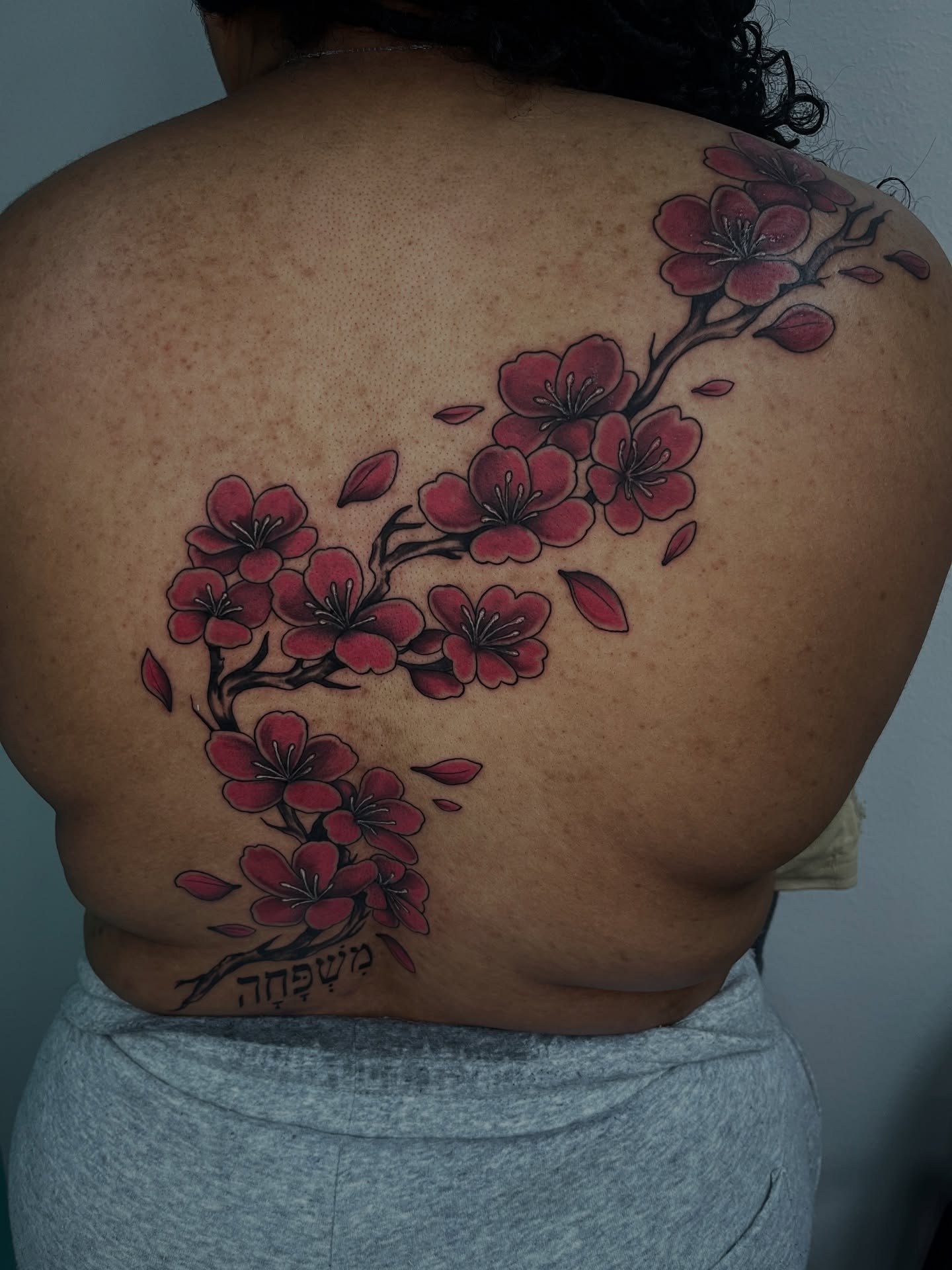 Cherry blossoms japanese irezumi tattoo on the back by Jordan Hunt