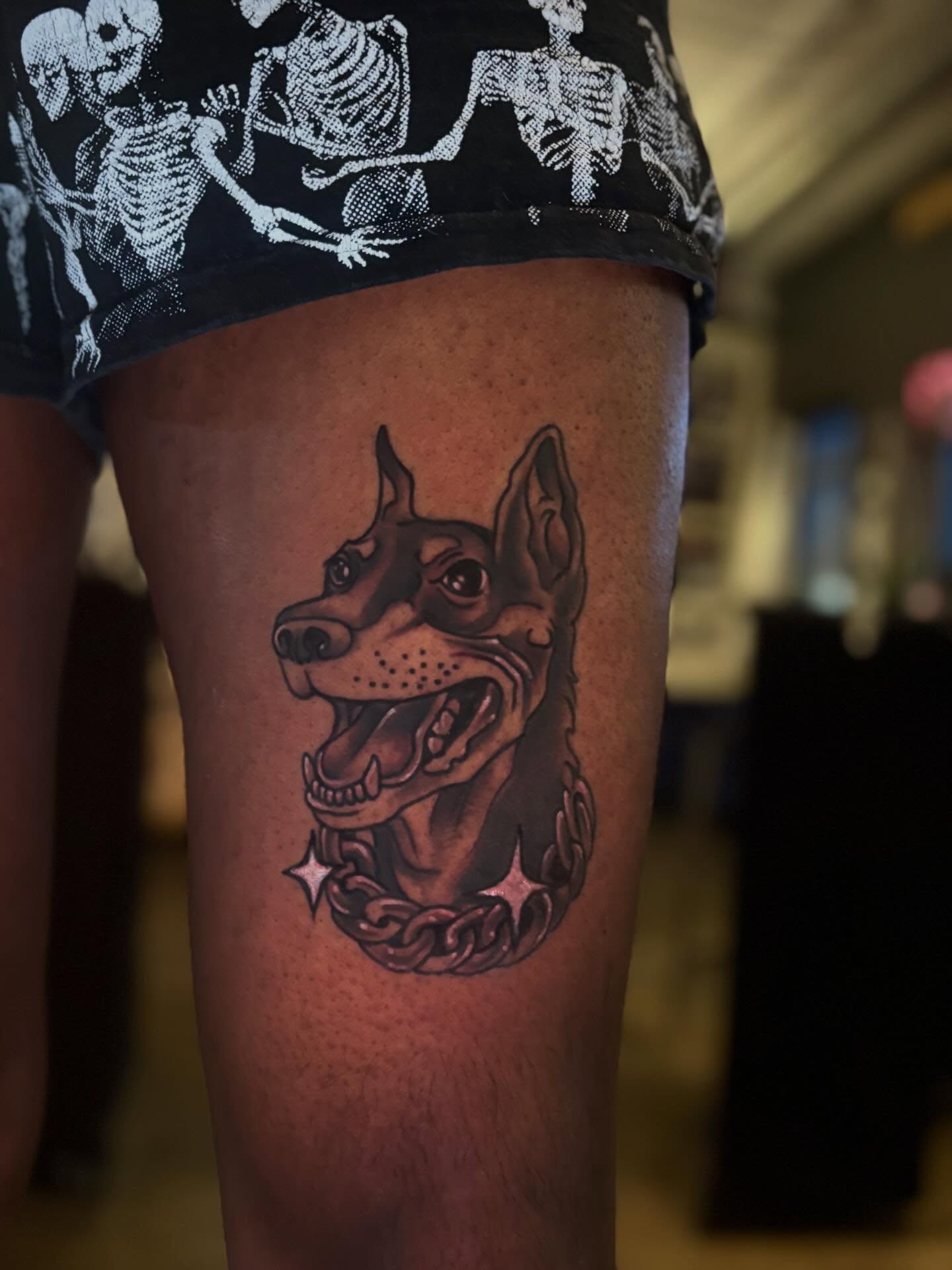 Dog head realism tattoo on the thigh by Mim