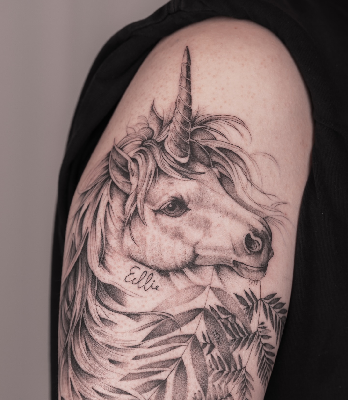 Unicorn realism tattoo on the shoulder by Leo Gao