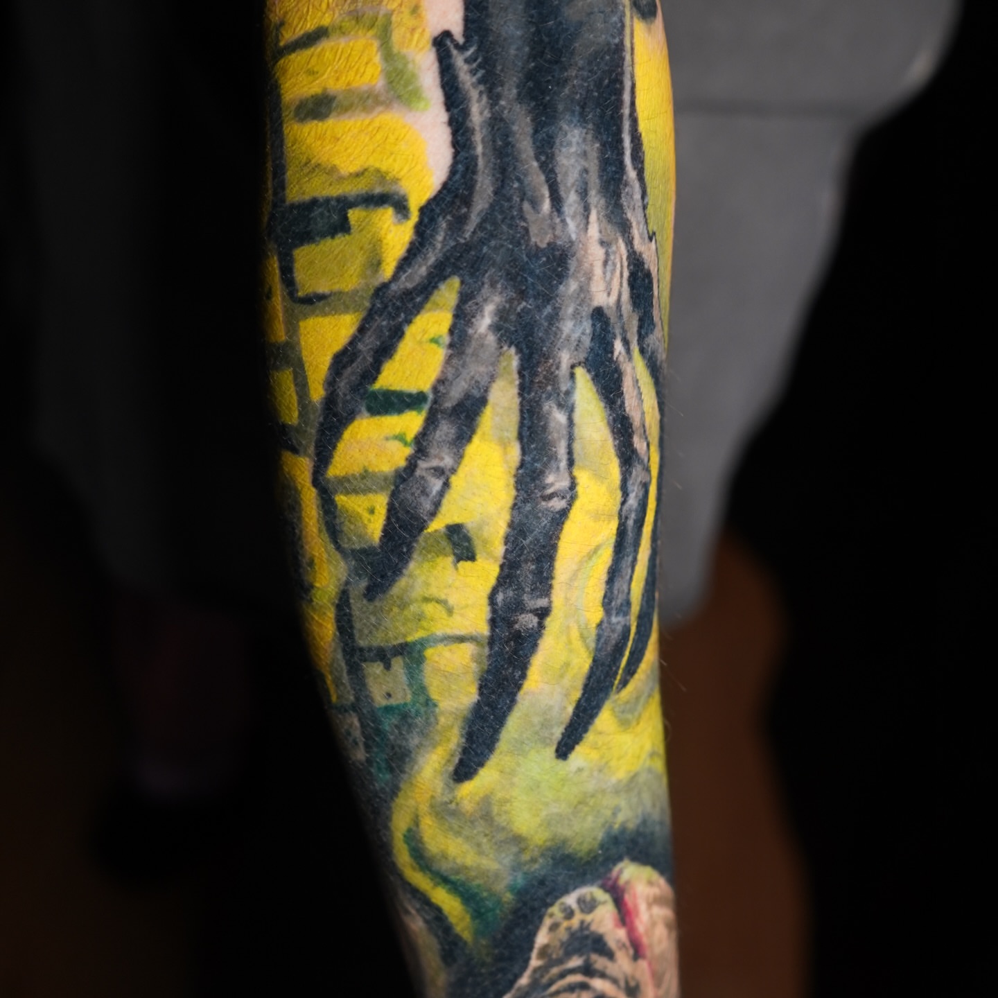 Clawed hand dotwork tattoo on the forearm by Darl Gnau