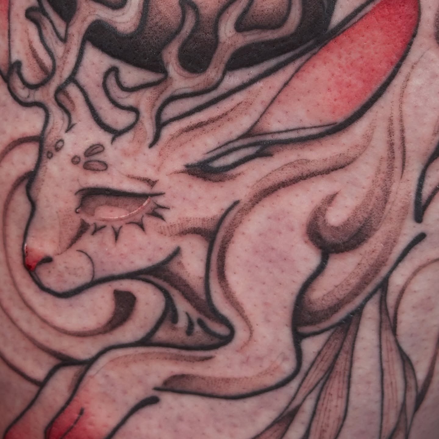 Demon face American traditional tattoo on the forearm by TATTOOLIZARD (James)
