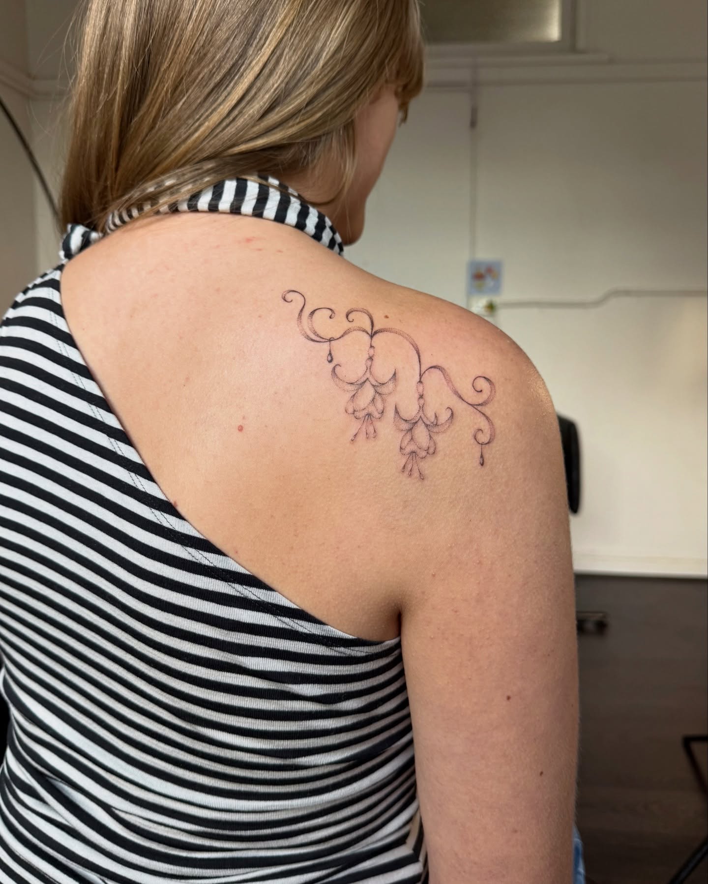 Bell flowers ornamental tattoo on the shoulder by Soomin
