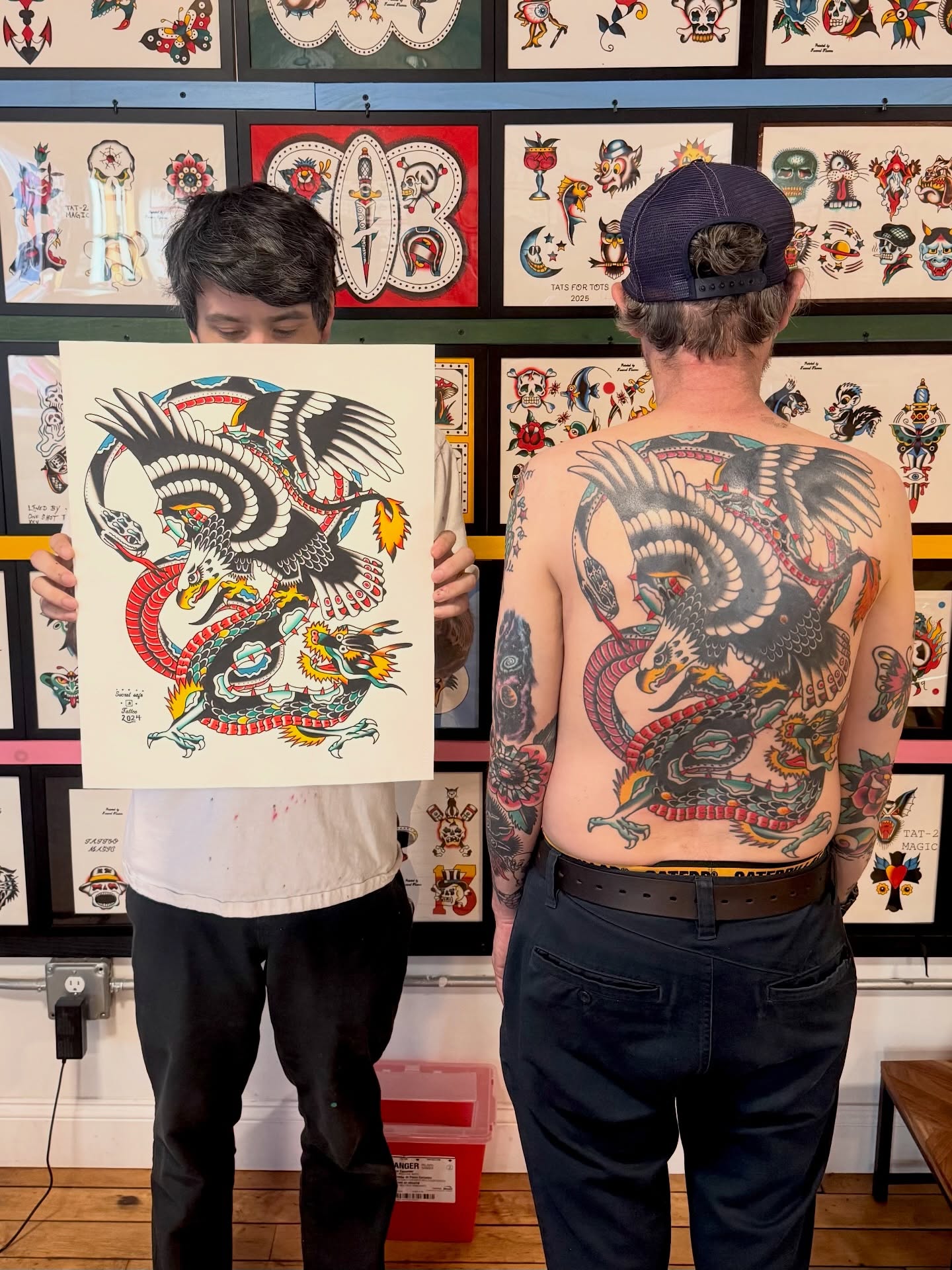 Dragon and snake American traditional tattoo on the back by Steven