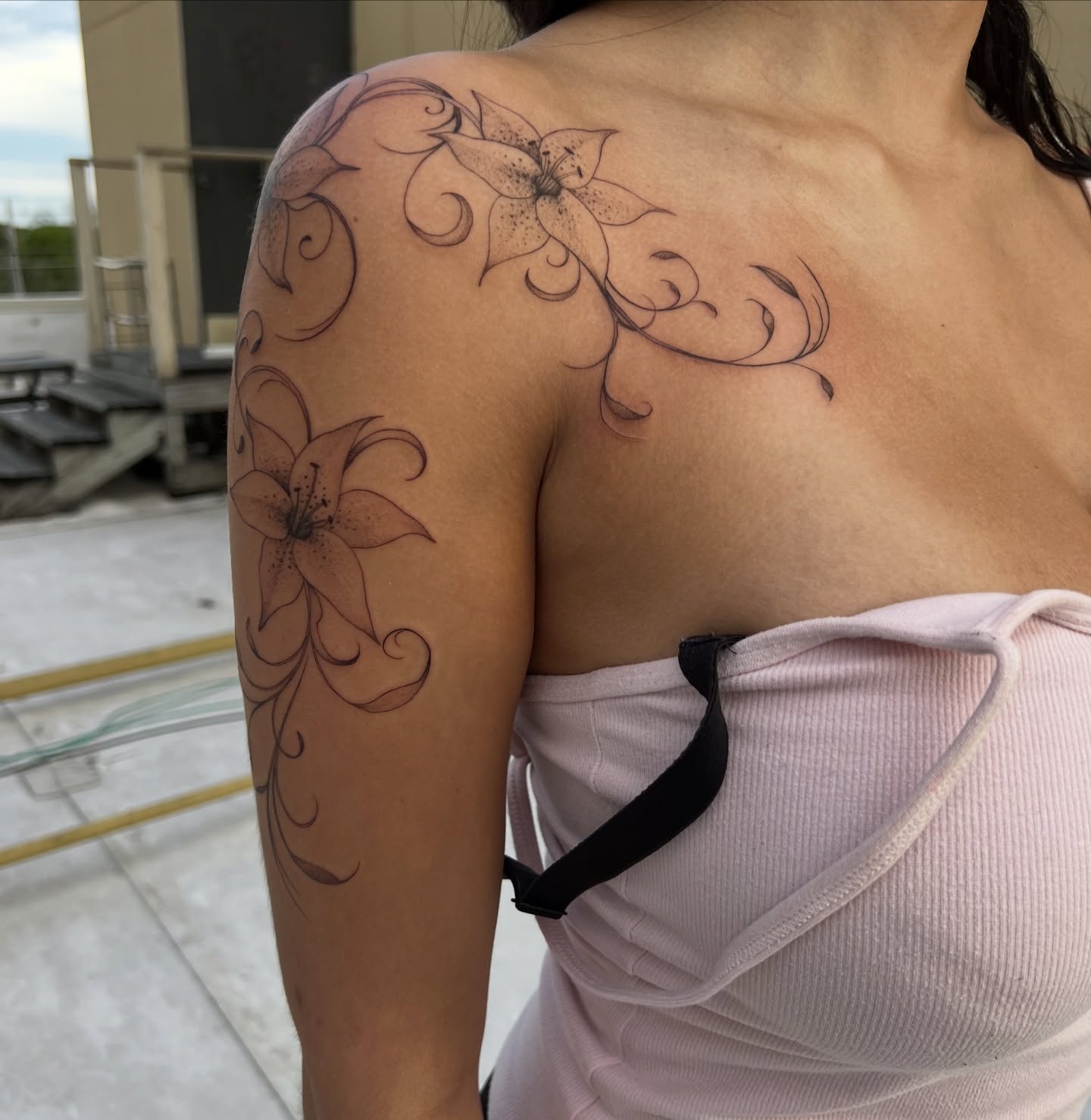 Lily flowers black and grey tattoo on the shoulder by syiko ☆ 。・:*˚:✧。, Austin, Texas