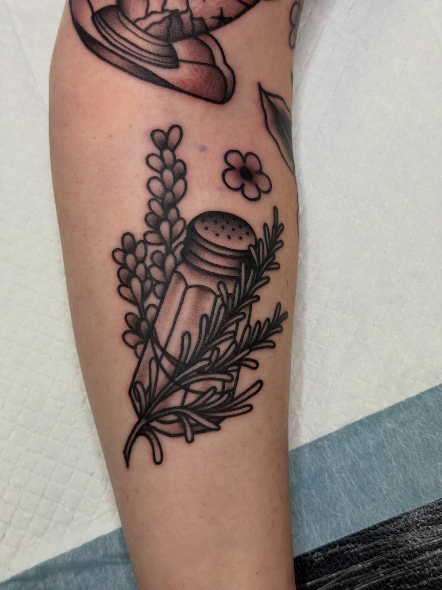 Herbs and jar black and grey tattoo on the forearm by Kelsey Louis, Iowa City, Iowa