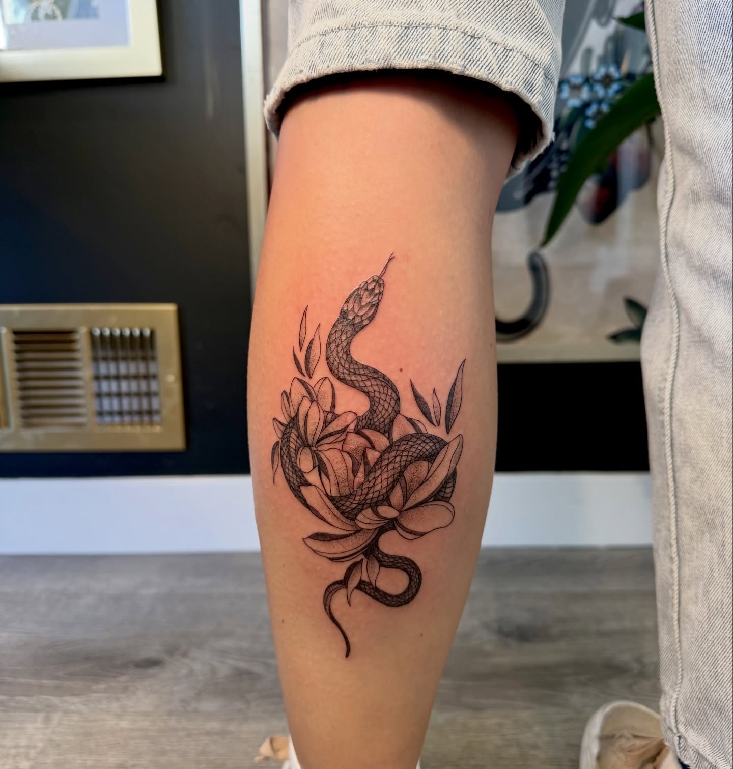 Snake and lotus black and grey tattoo on the forearm by Ki ☆ SLC TATTOO ARTIST