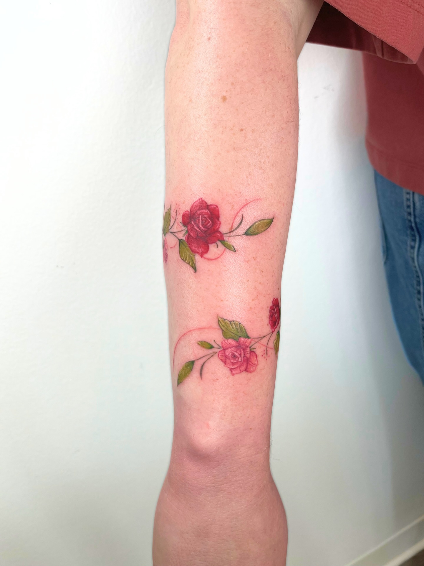 Roses realism tattoo on the forearm by kt