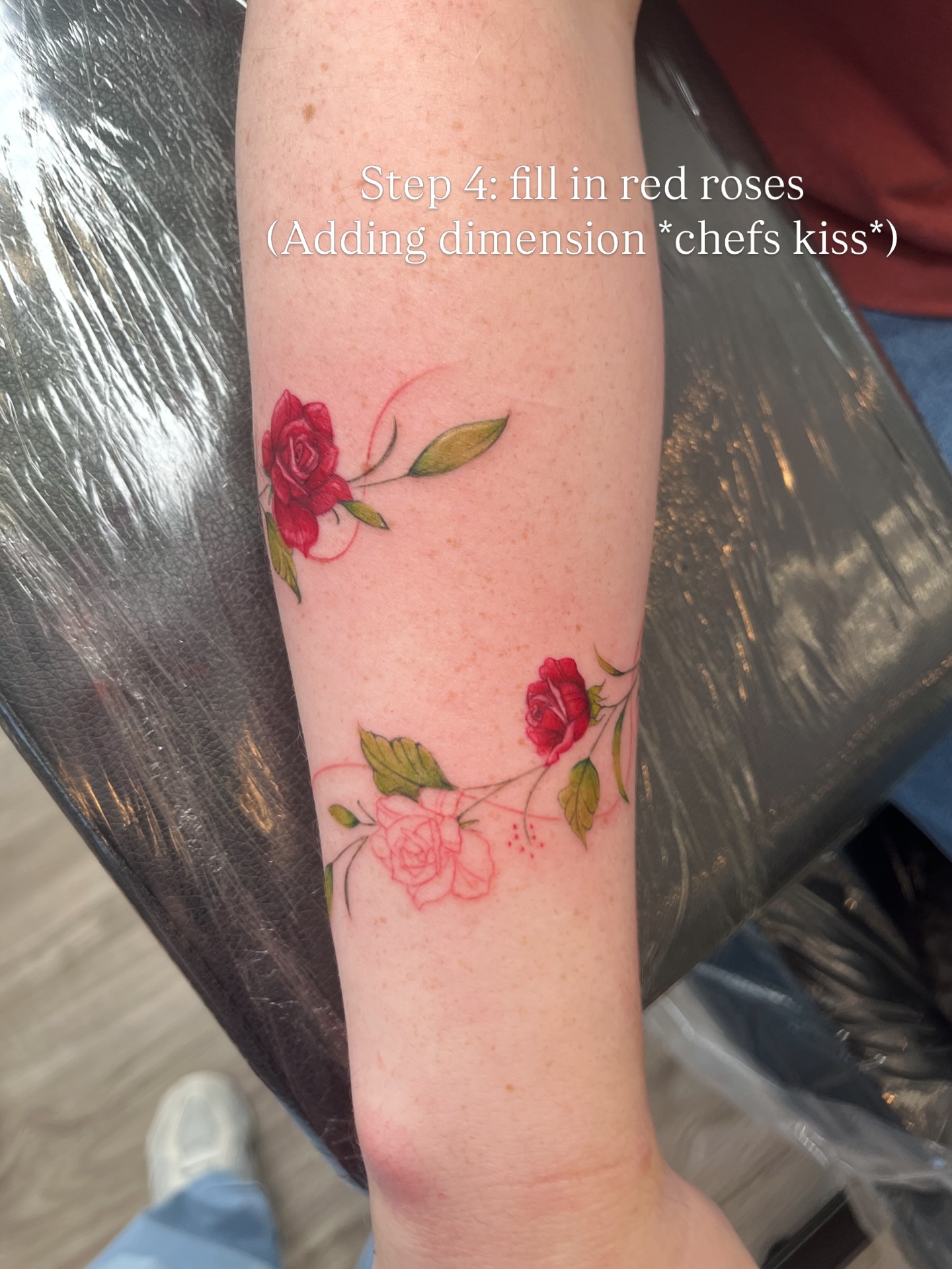 Red roses realism tattoo on the forearm by kt