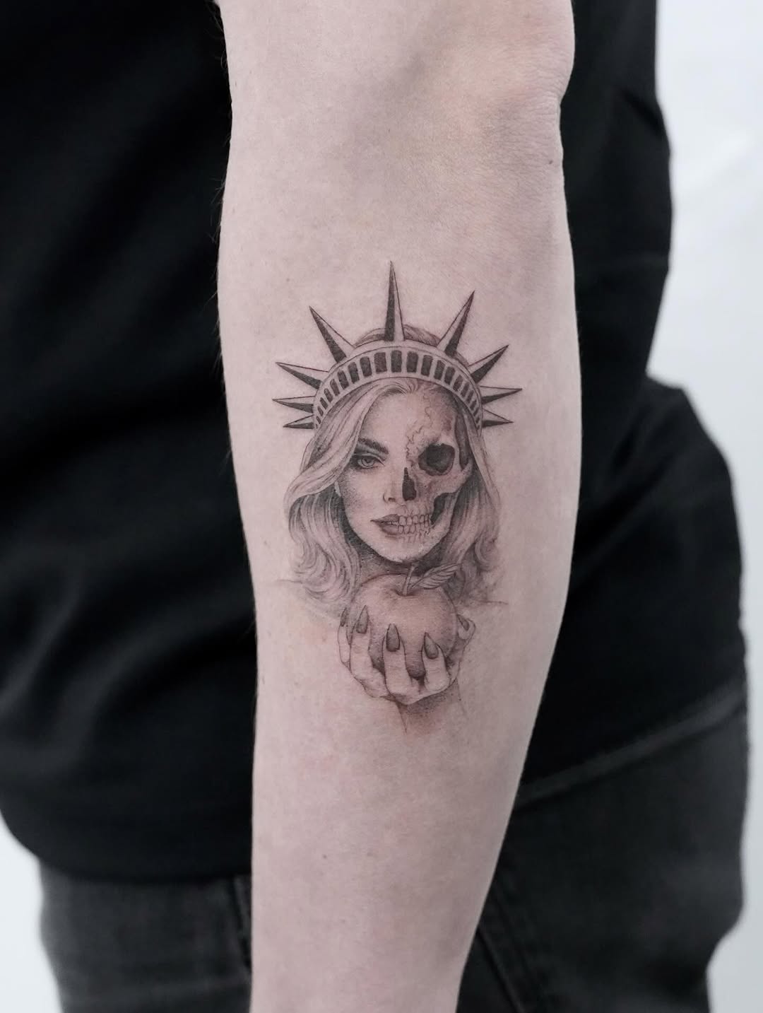 Statue of Liberty half skull dark art tattoo on the forearm by Julia