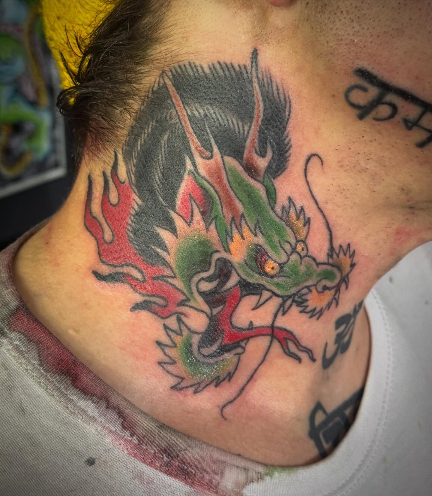 Dragon American traditional tattoo on the neck by Eric James, Columbus, Ohio