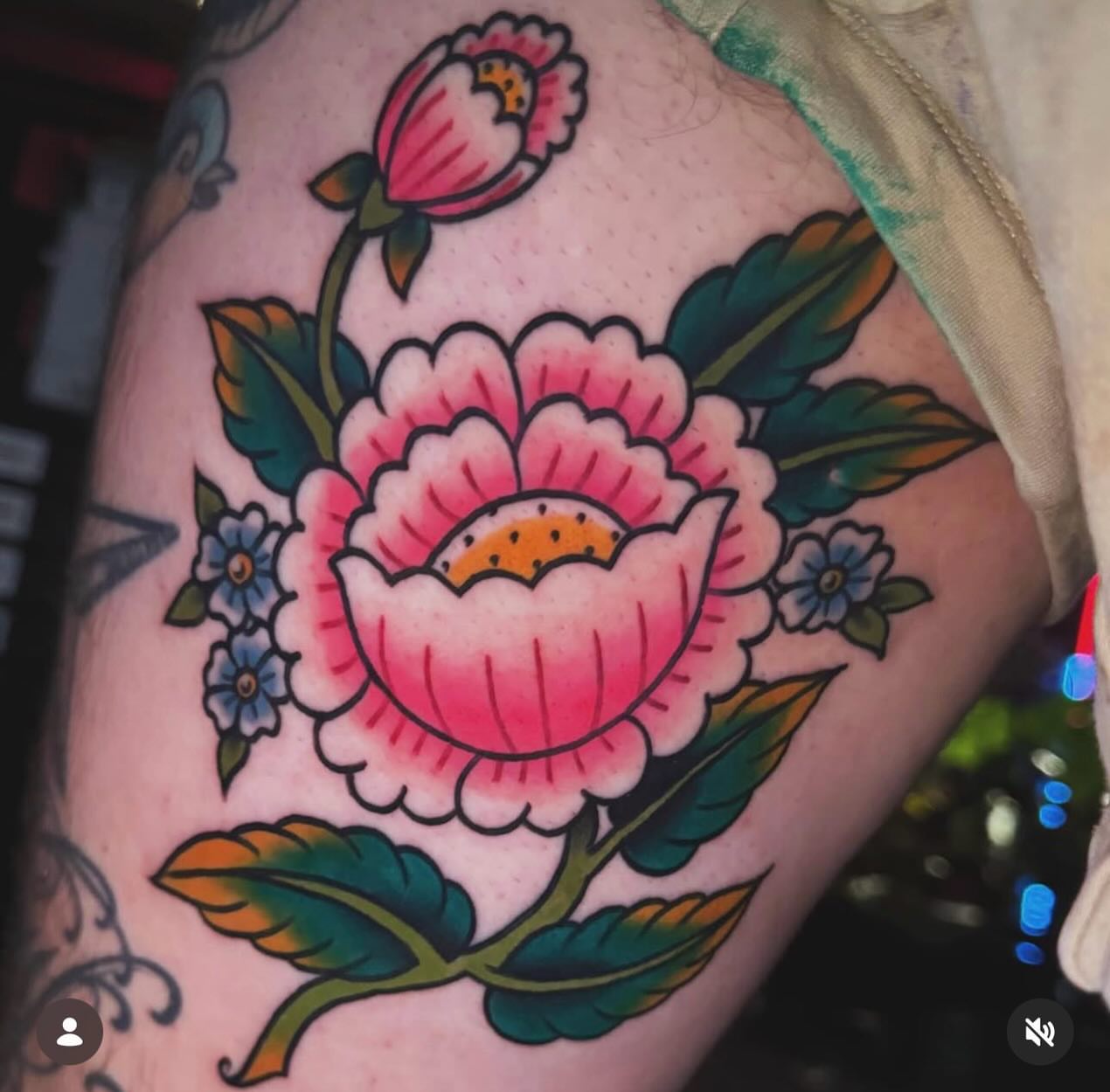 Peony flower American traditional tattoo on the thigh by Nikki Bee