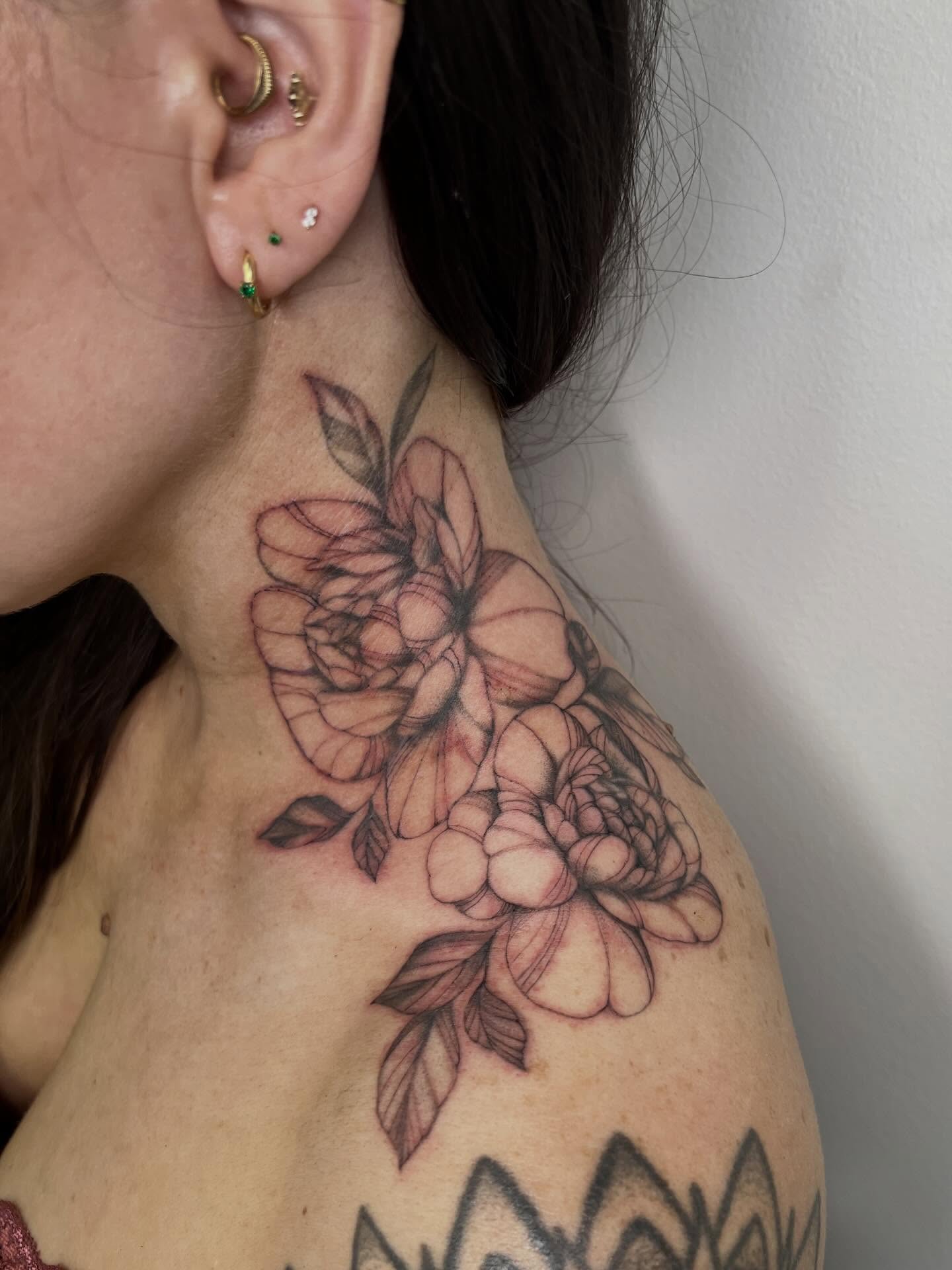 Floral arrangement realism tattoo on the neck by Presley Tattoos, Murfreesboro, Tennessee