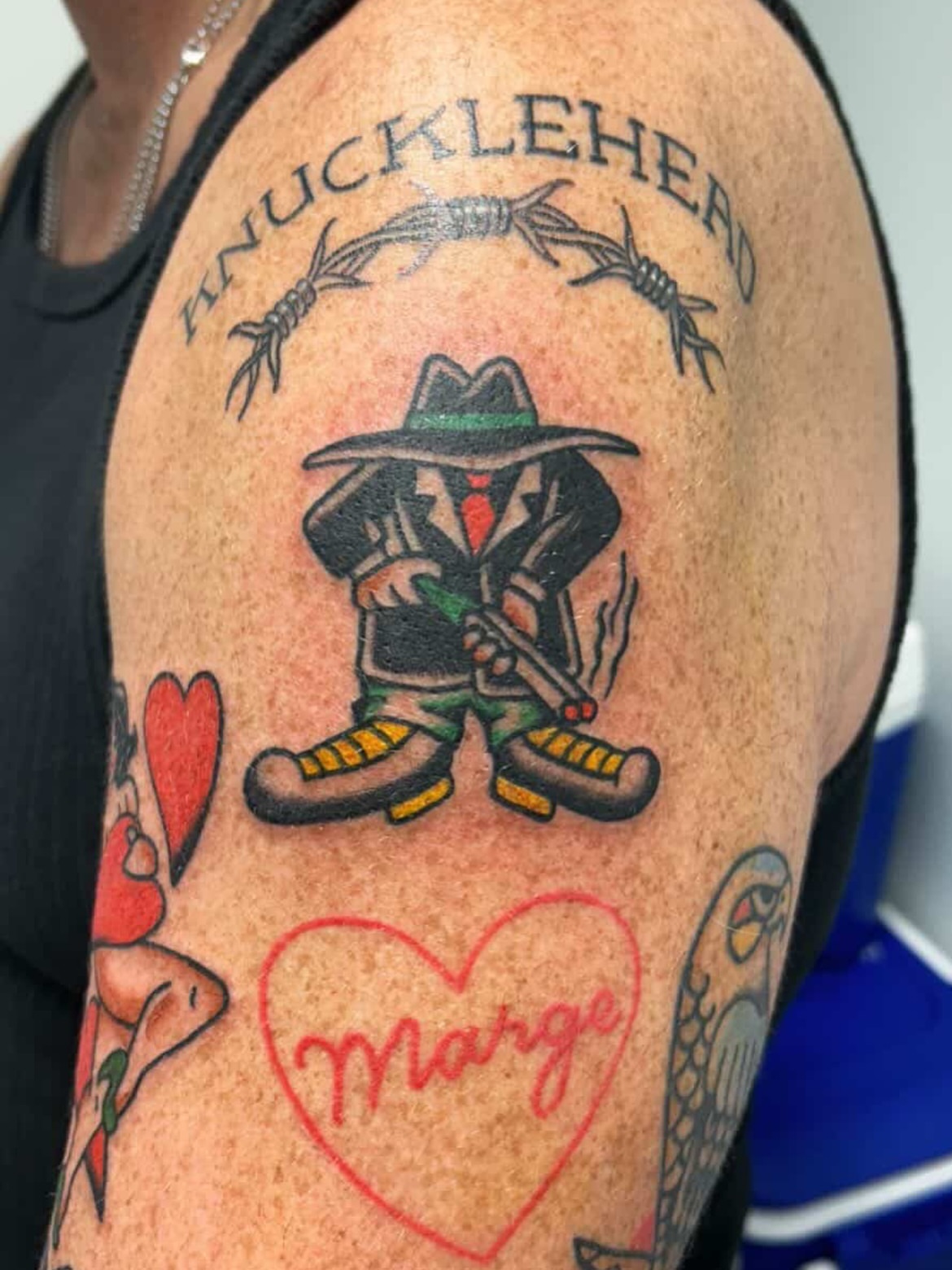 Cowboy with rifle American traditional tattoo on the shoulder by Tawni Bender