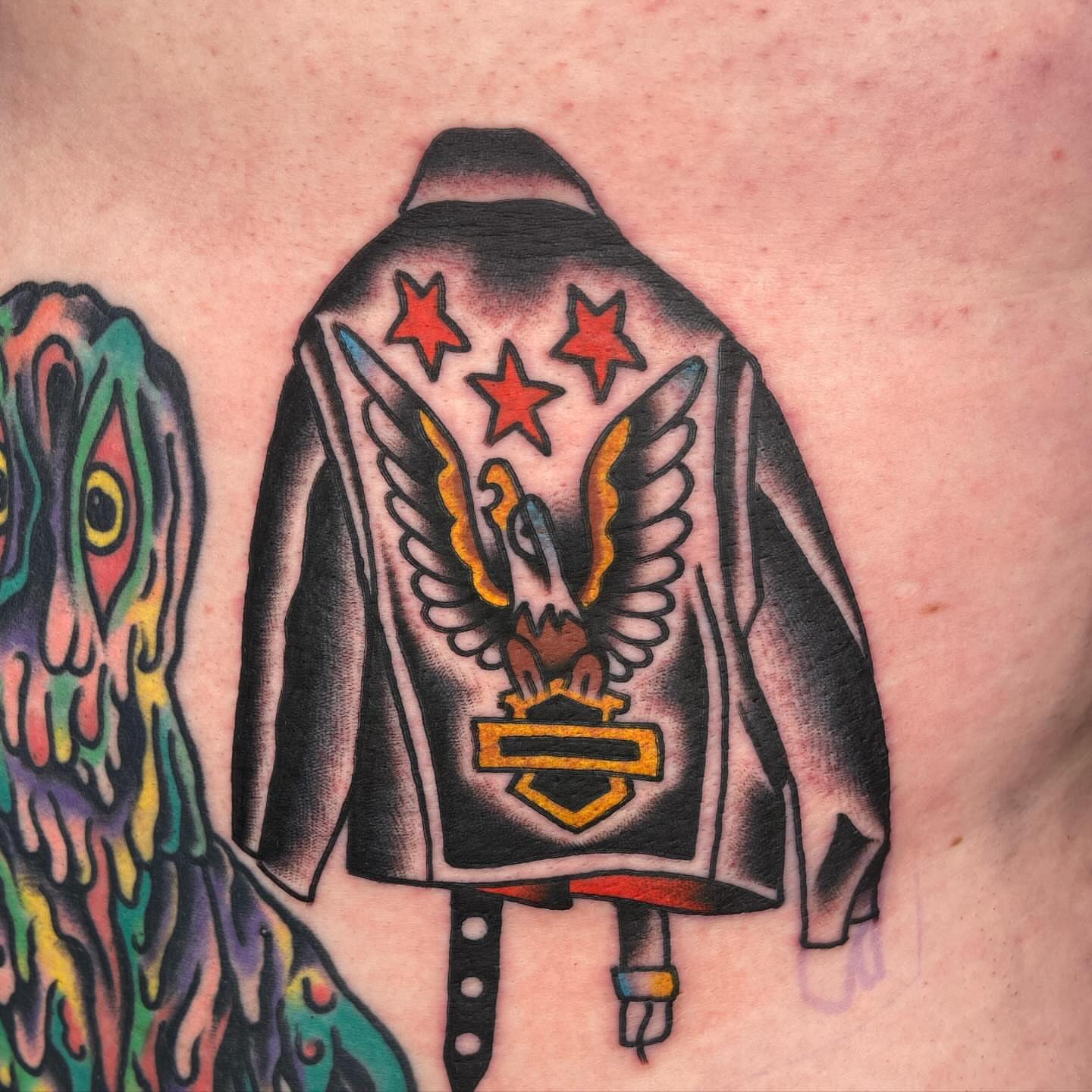Motorcycle jacket American traditional tattoo on the torso by Anthony Jaeger, Seattle, Washington