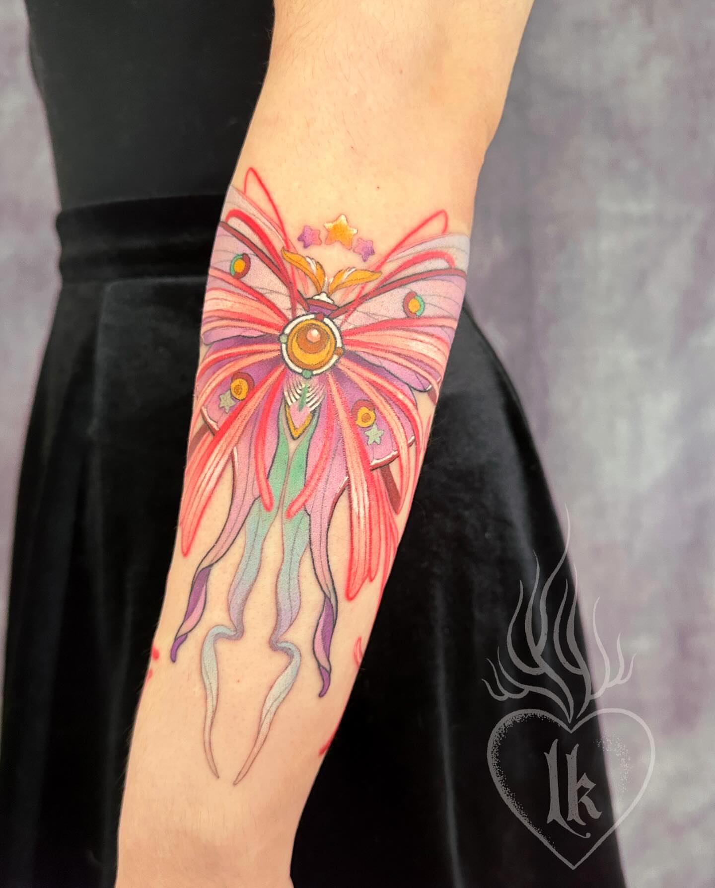 Abstract butterfly new school tattoo on the forearm by Hillary