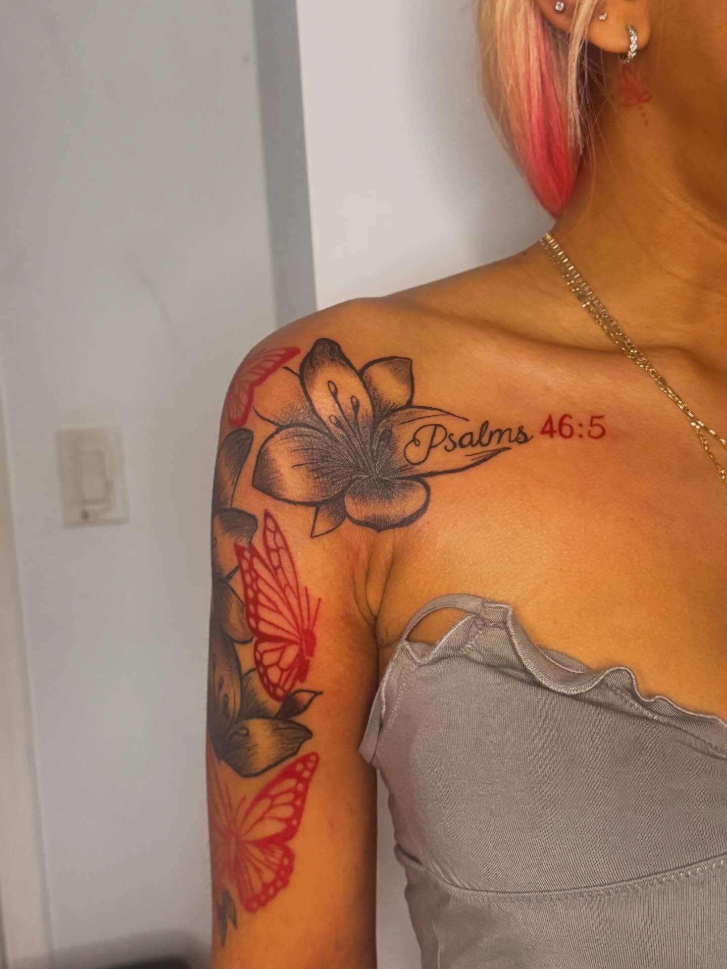 Flower and butterfly black and grey tattoo on the shoulder by Comet