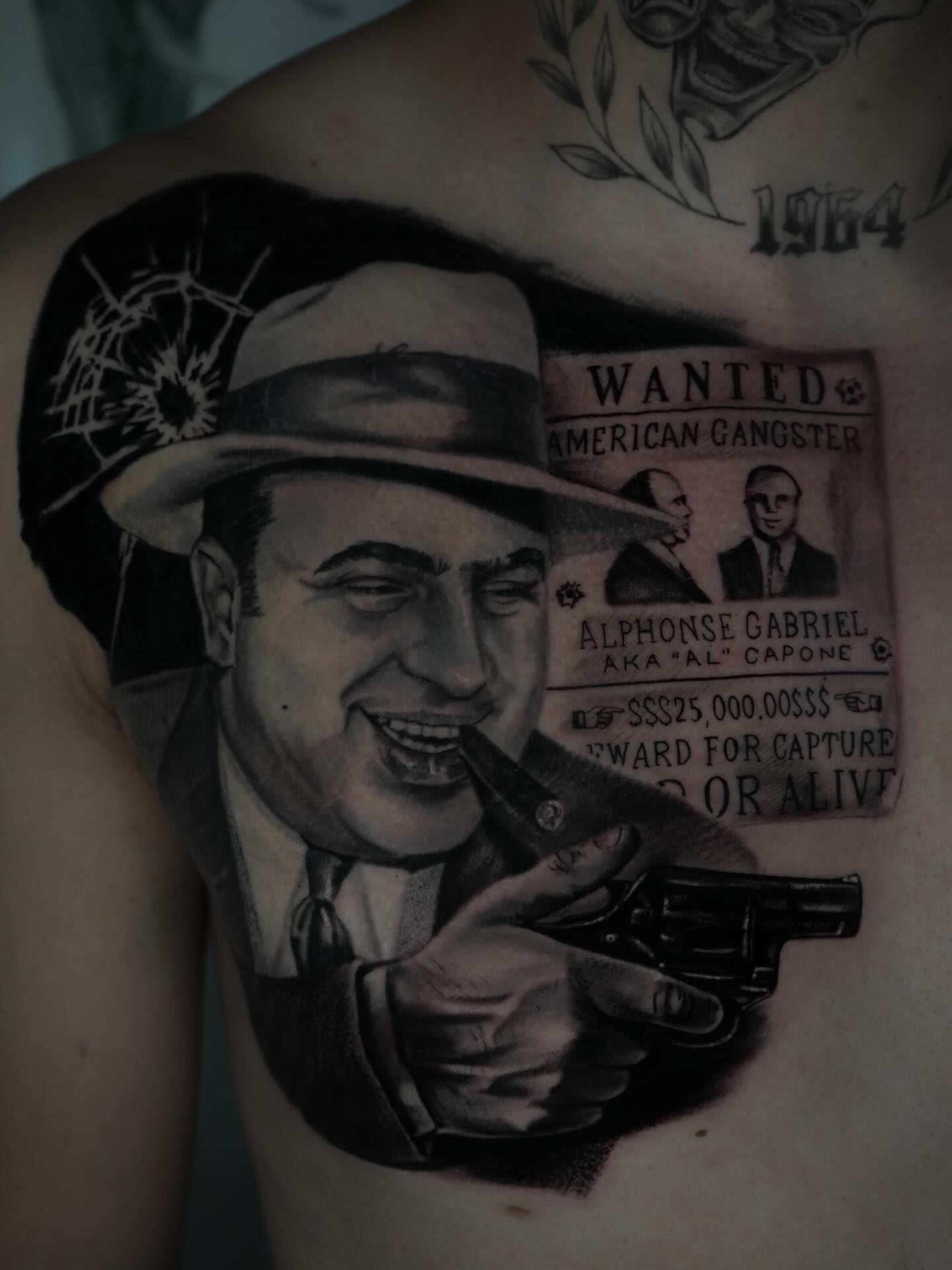 American gangster realism tattoo on the chest by Carlos Trujillo