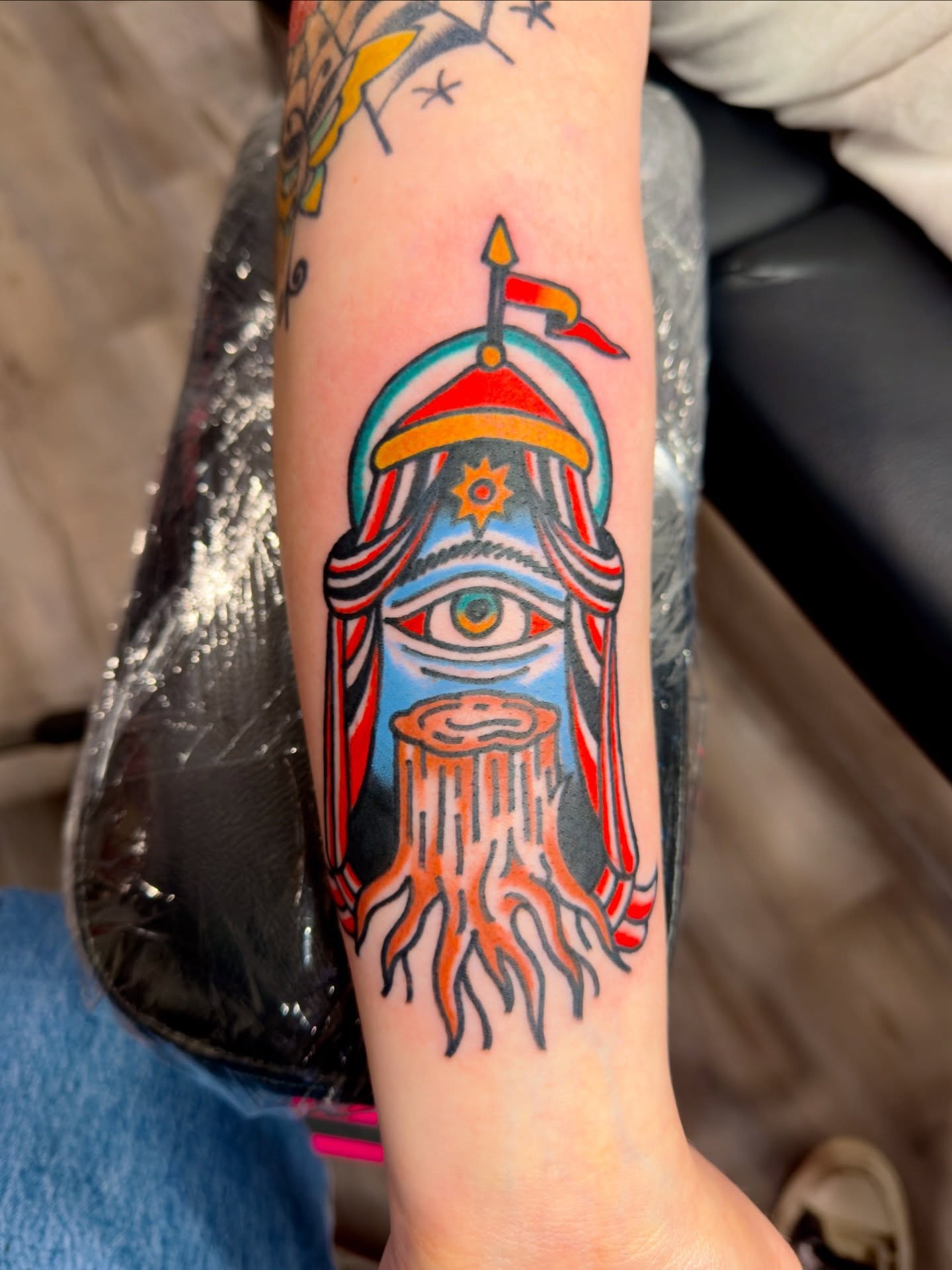 Viking helmet American traditional tattoo on the forearm by Jimmy Kelley