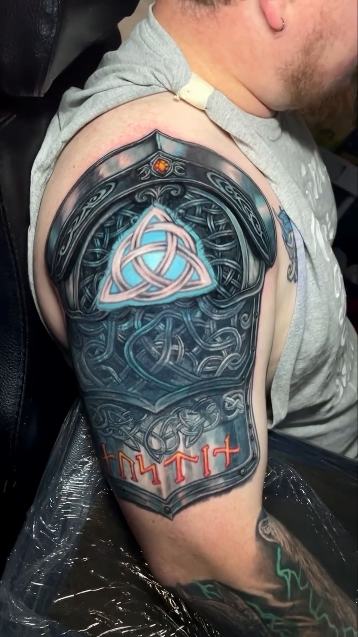 Tattoo by @relliott_artist — black_and_grey, realism