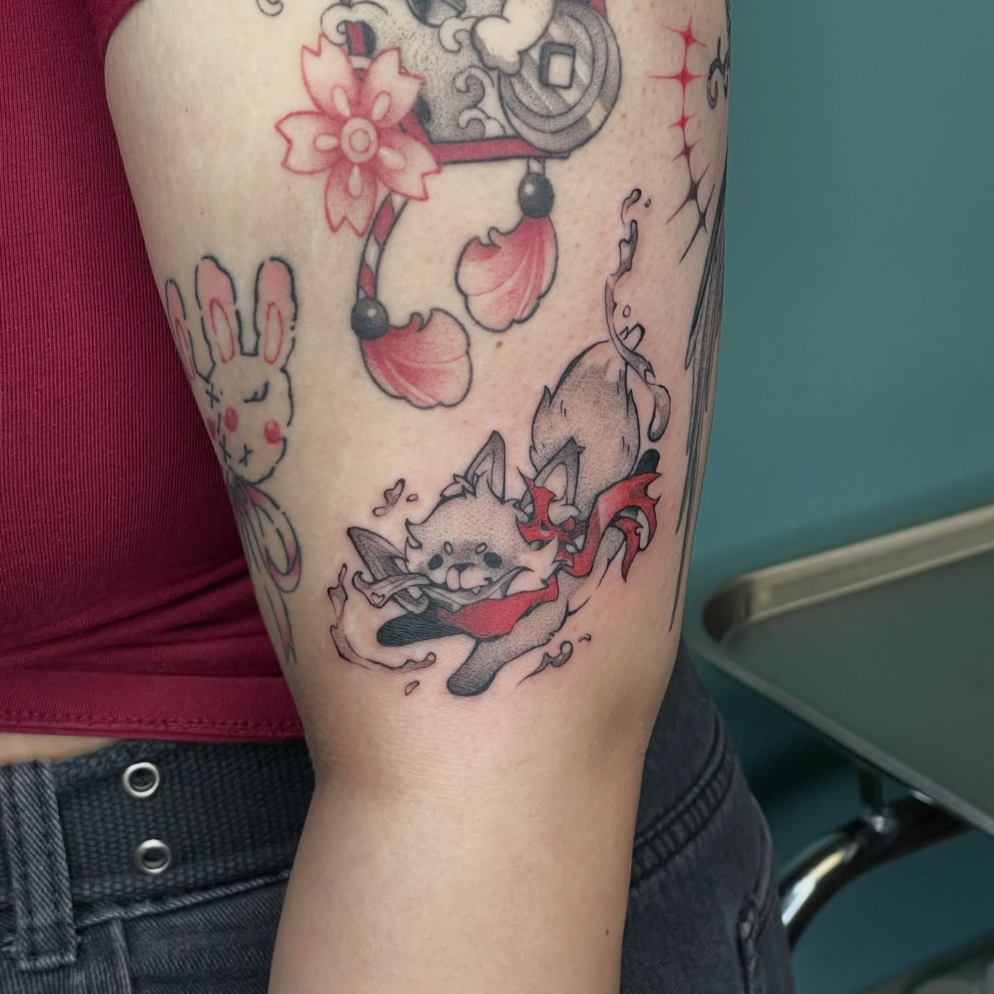 Cat and rabbit American traditional tattoo on the forearm by Mia 	\(★ω★)