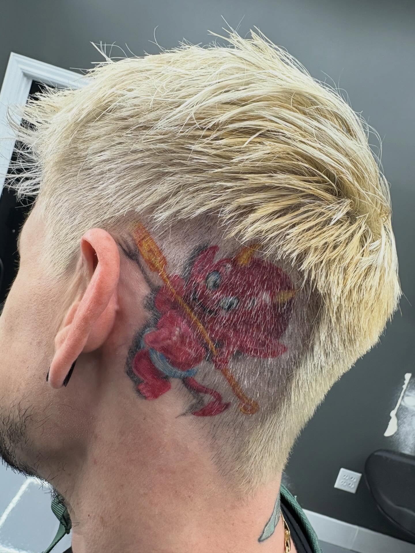 Red dragon dotwork tattoo on the head by Yvonne