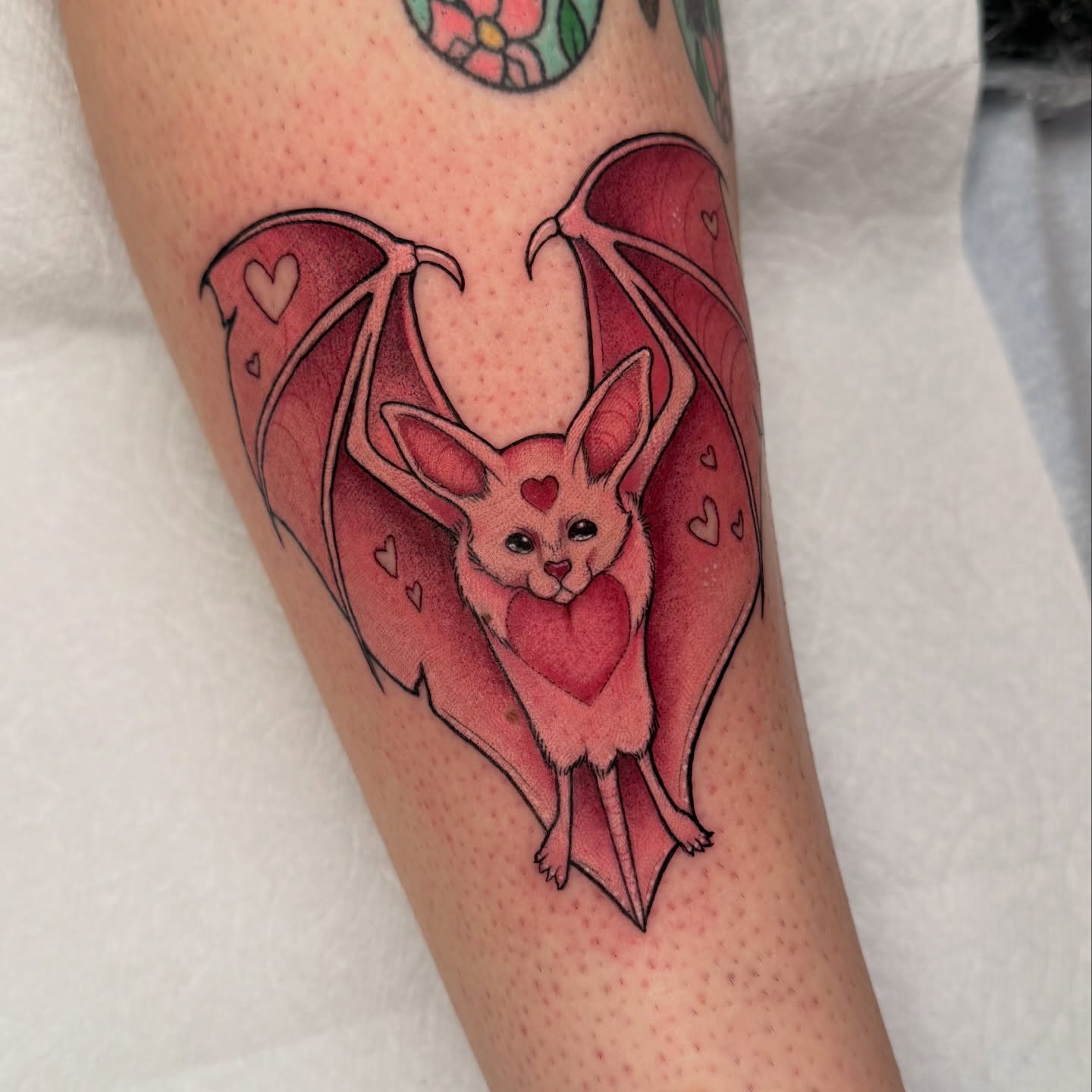 Bat with heart dotwork tattoo on the forearm by Maia Papaya Tattoos 🐝 Olympia Tattoo Artist