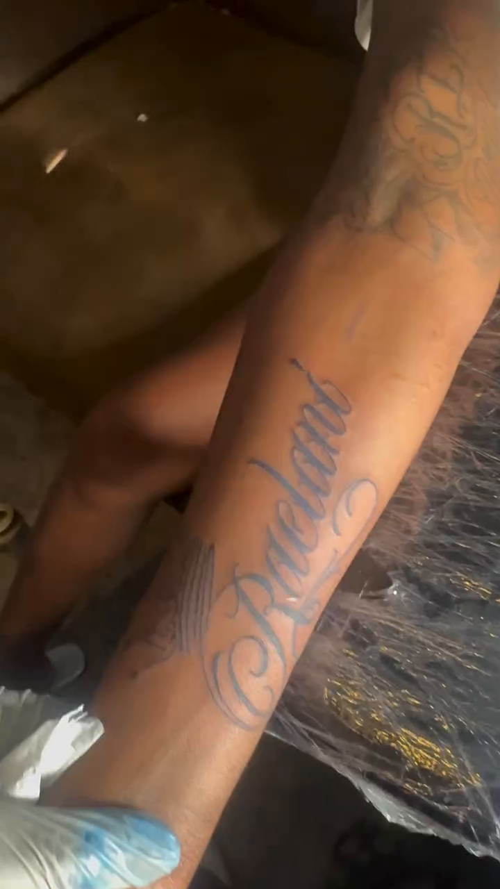 Name tattoo lettering tattoo on the leg by TP