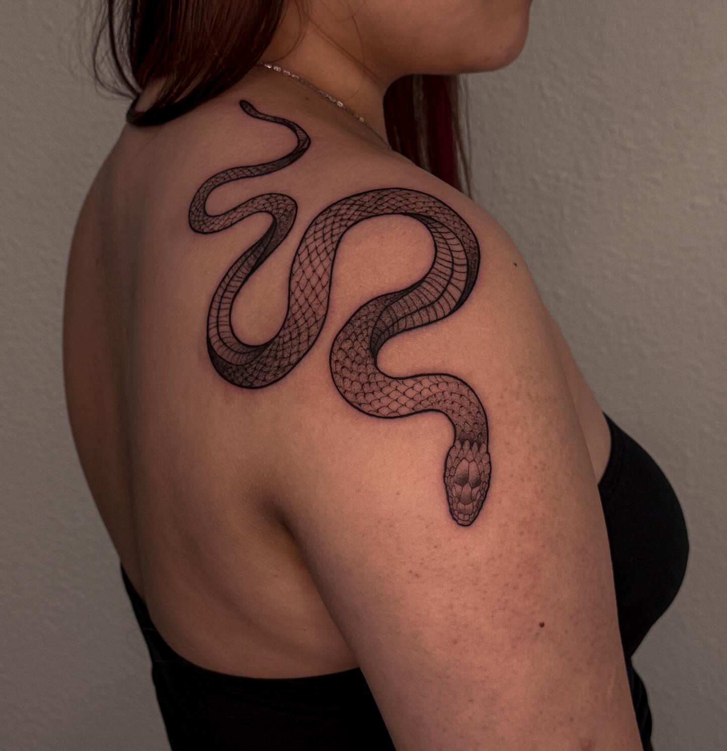 Snake black and grey tattoo on the shoulder by Las Vegas Tattoo Artist
