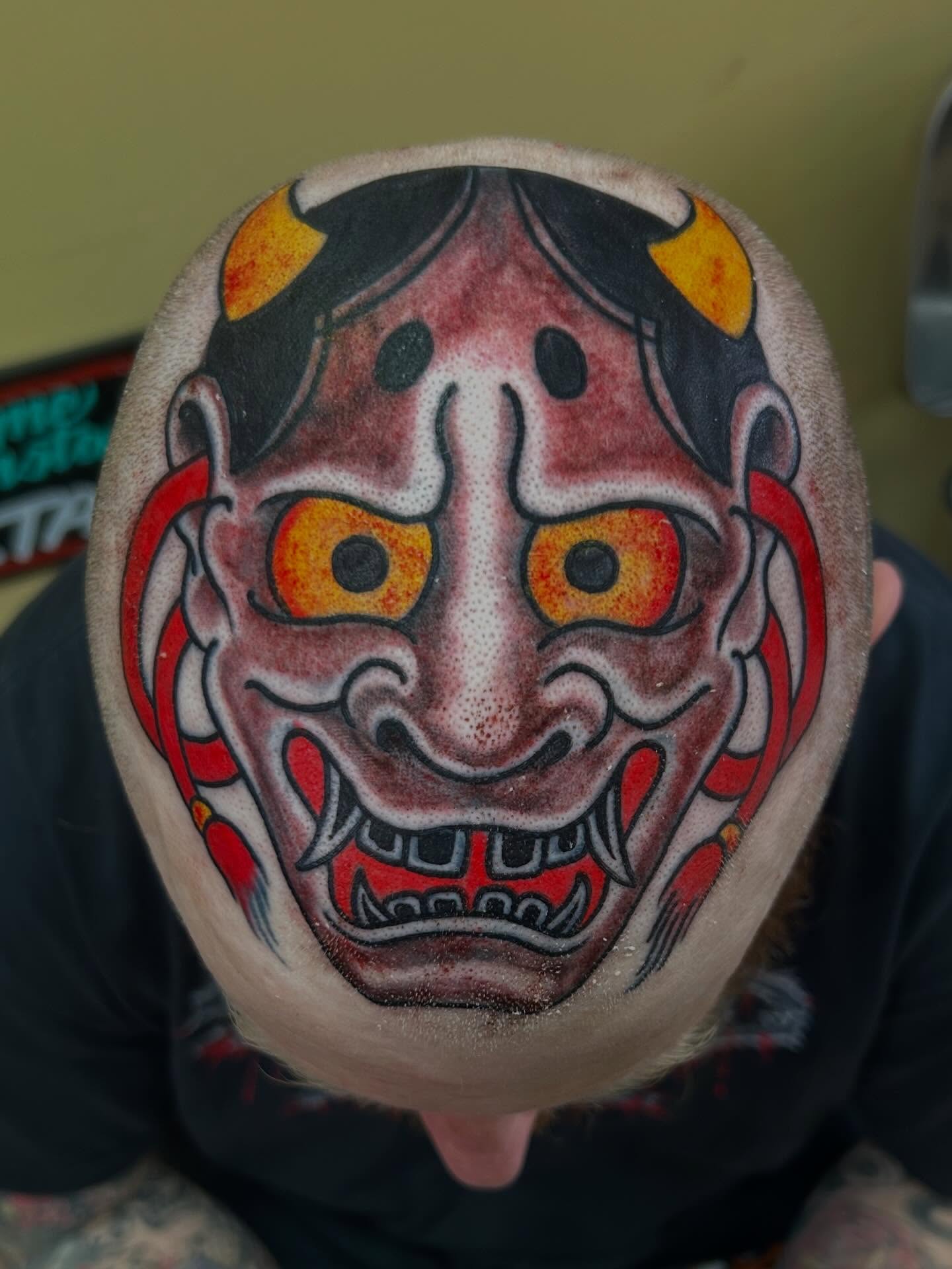 Demon mask japanese irezumi tattoo on the head by Katie Dexter, Des Moines, Iowa