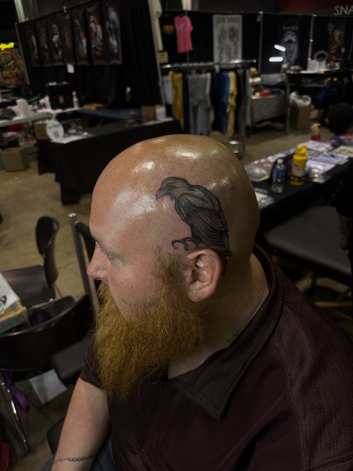 Crow black and grey tattoo on the head by Elizabeth’s Eclectic Tattoos