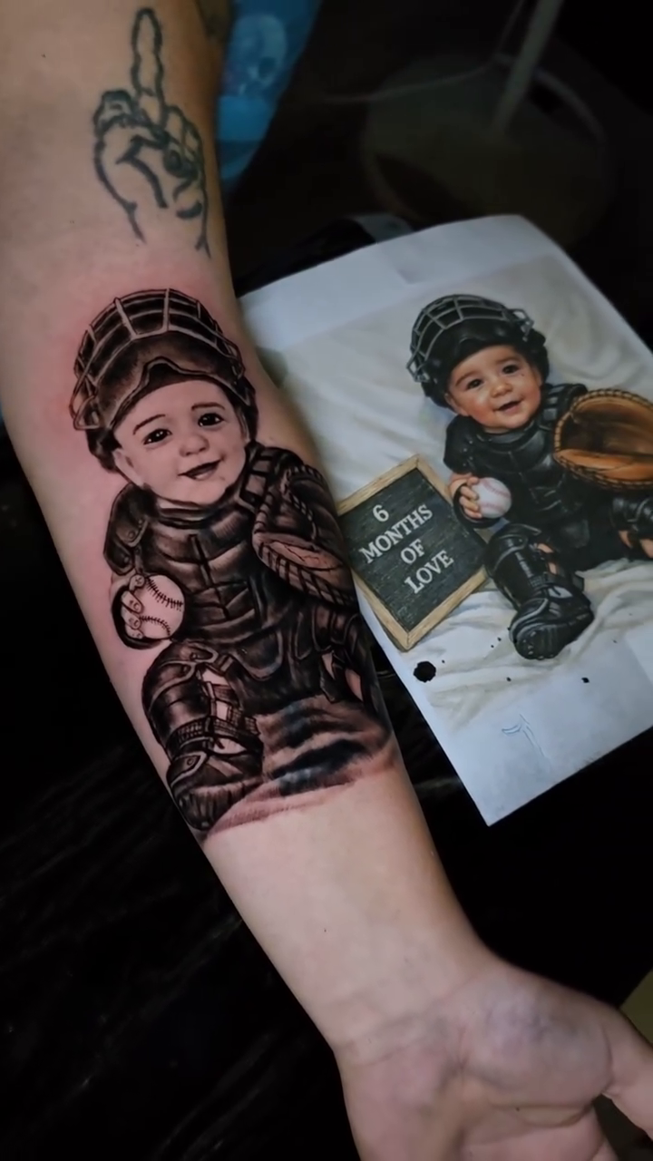 Baby in hockey gear realism tattoo by Jesse James, Las Vegas, Nevada