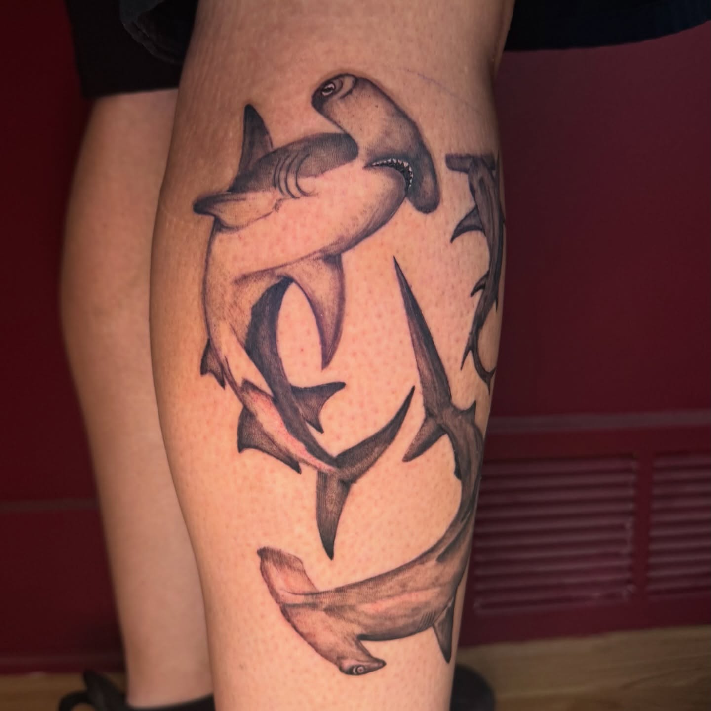 Shark black and grey tattoo on the thigh by @inkedbybanti