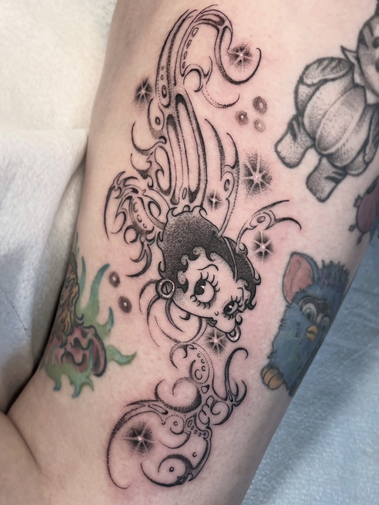 Betty boop black and grey tattoo on the forearm by Allyson Blessing Tattoos