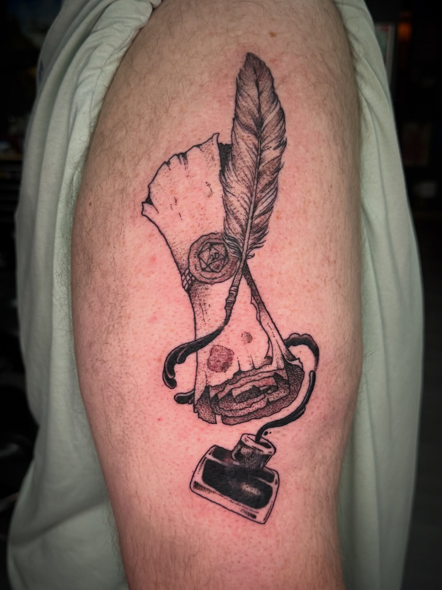 Quill and parchment black and grey tattoo on the forearm by Erin Morbid