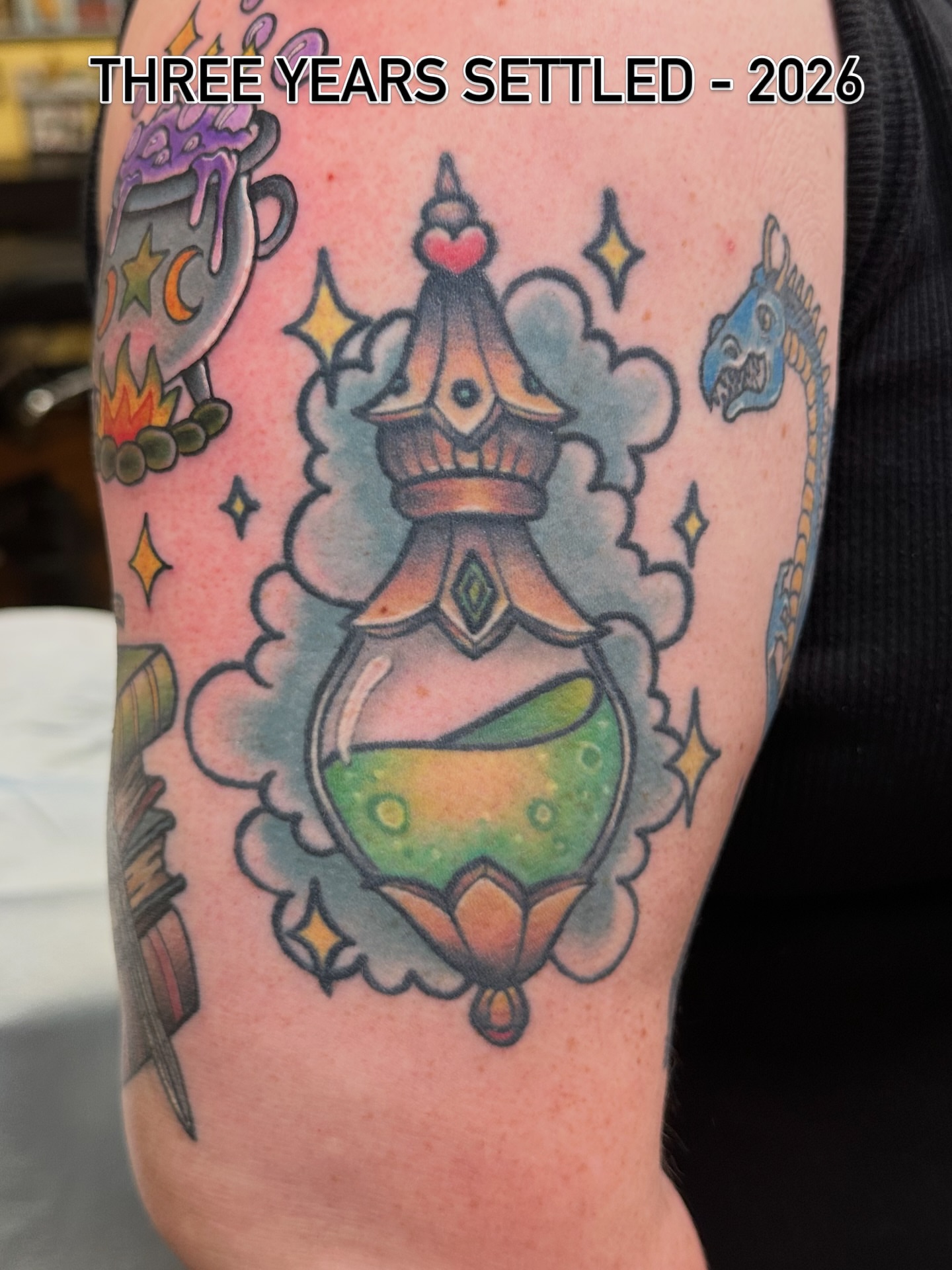 Glass bottle with colorful liquid American traditional tattoo on the forearm by Nick Bones, Las Vegas, Nevada