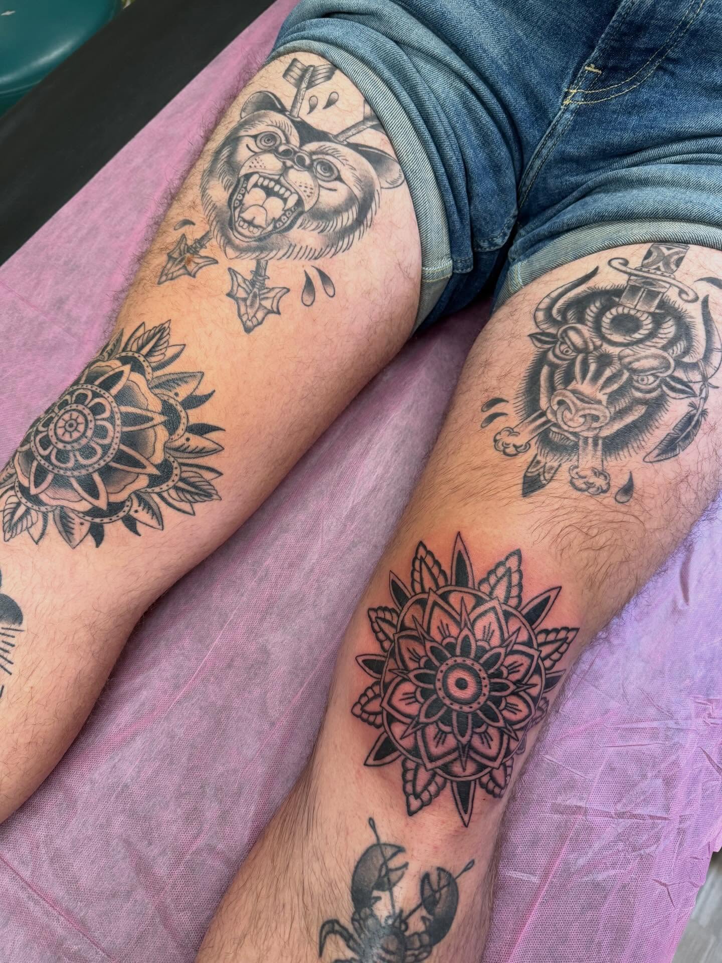 Animal heads and mandalas American traditional tattoo on the forearm by charlie