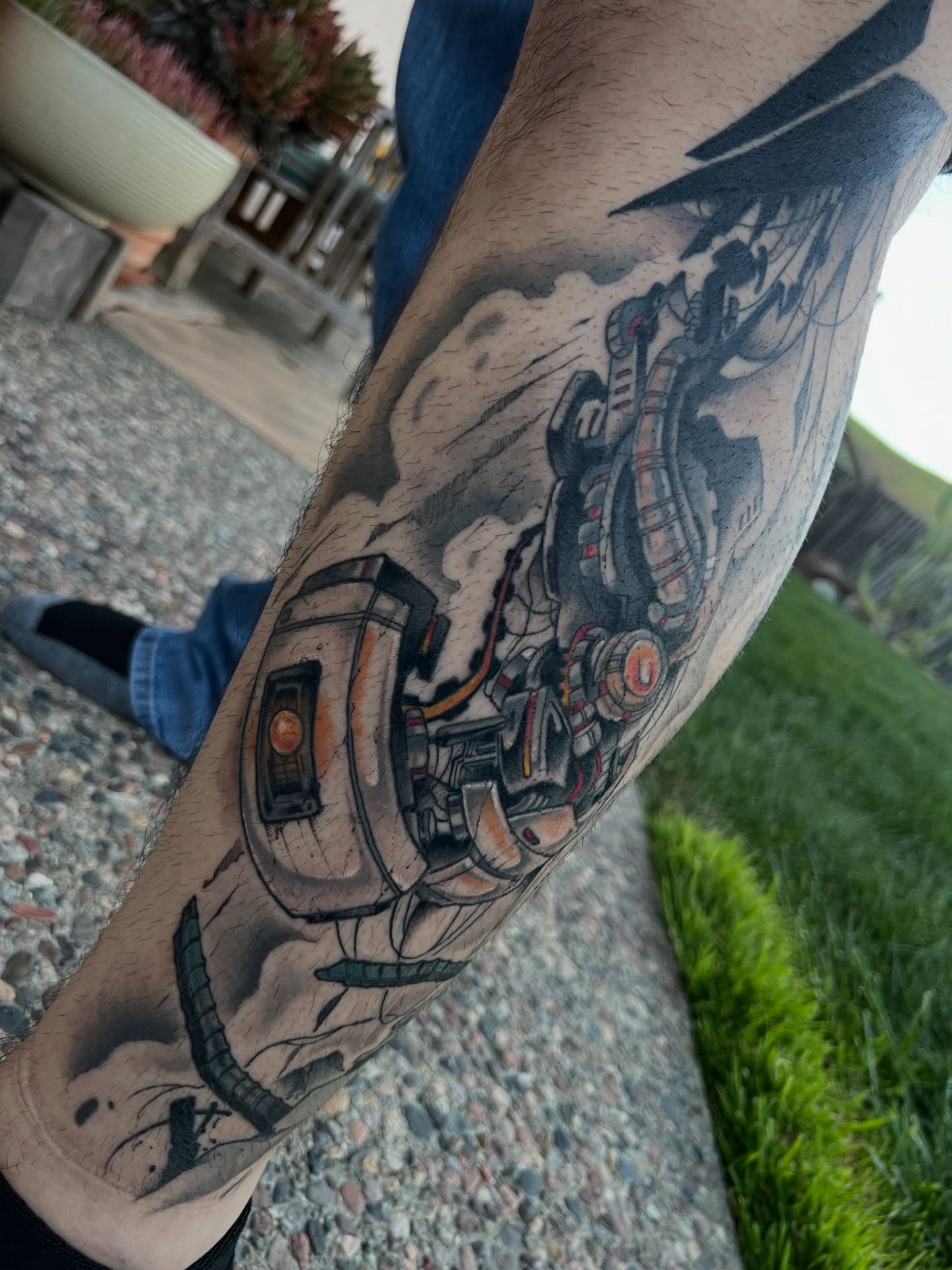 Cyberpunk vehicle realism tattoo on the forearm by Owen Smith -OEOS- SF