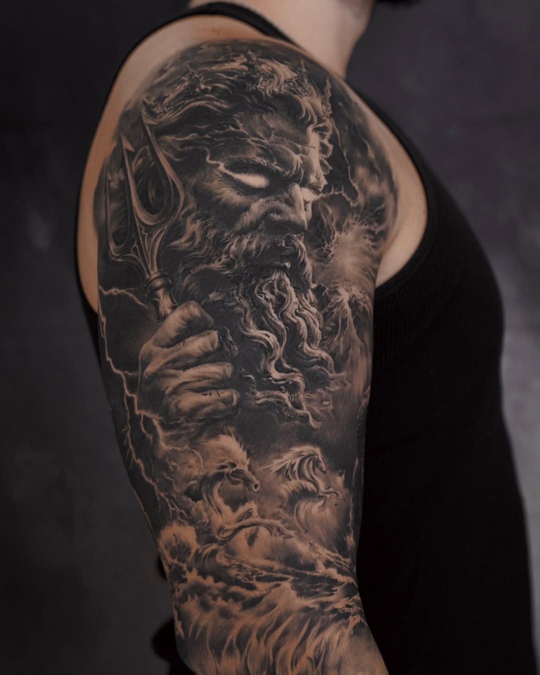 Poseidon with trident and horses realism tattoo on the forearm by Xin Wang